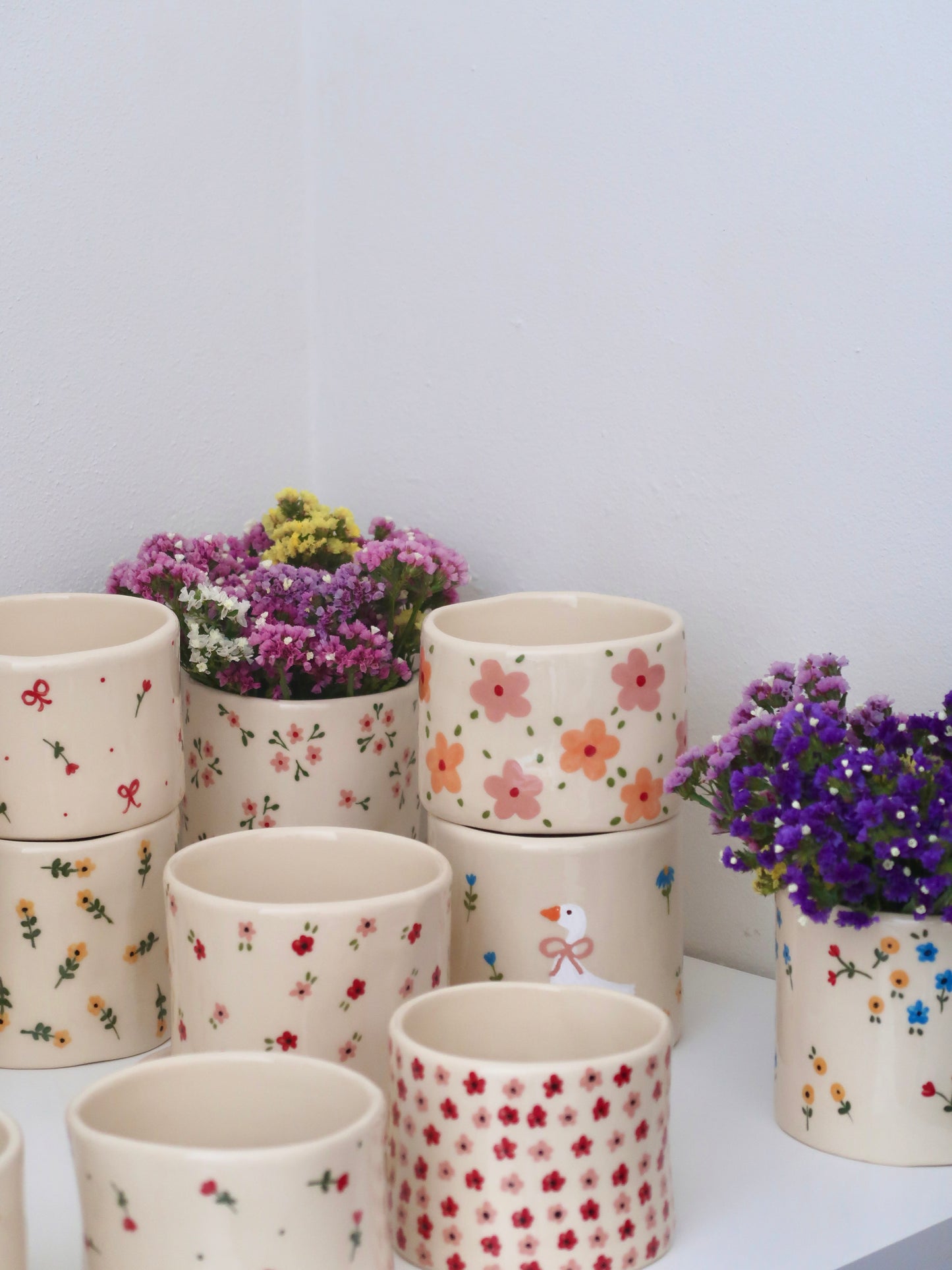 Vase with pink and orange flowers