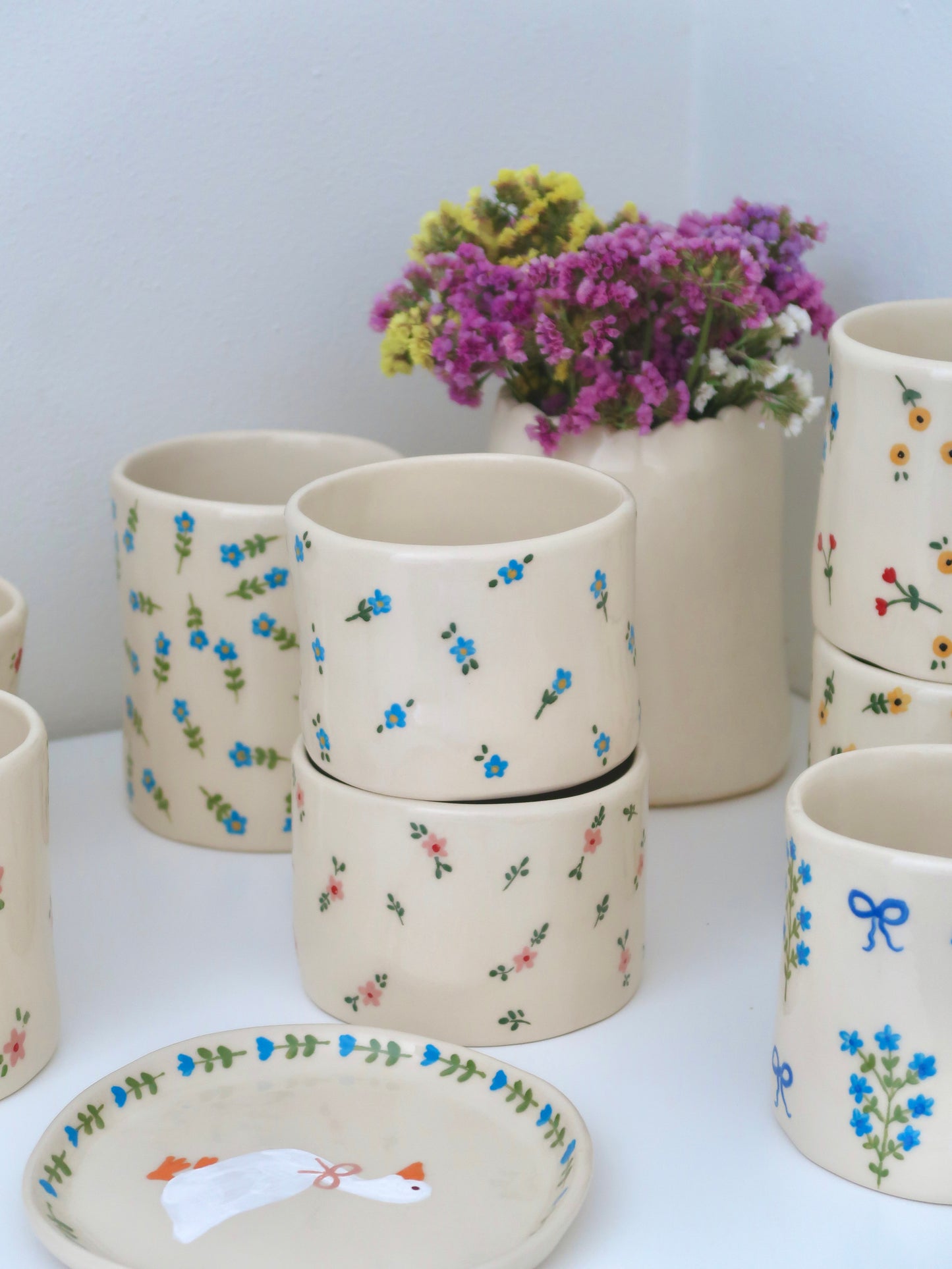 Vase with blue flowers