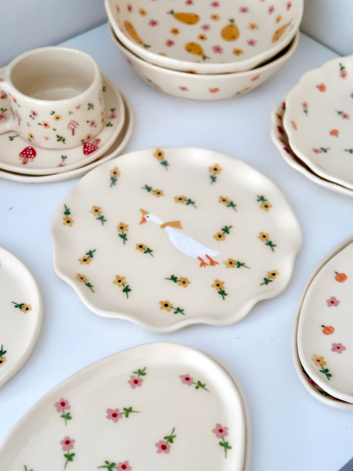 Wavy plate with a duck and yellow flowers
