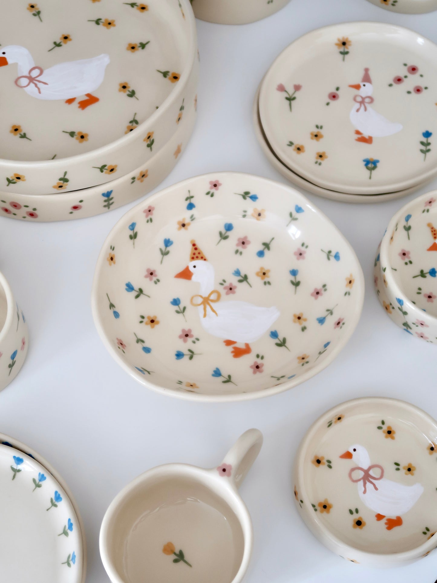 Bowl with a duck and multicolor flowers