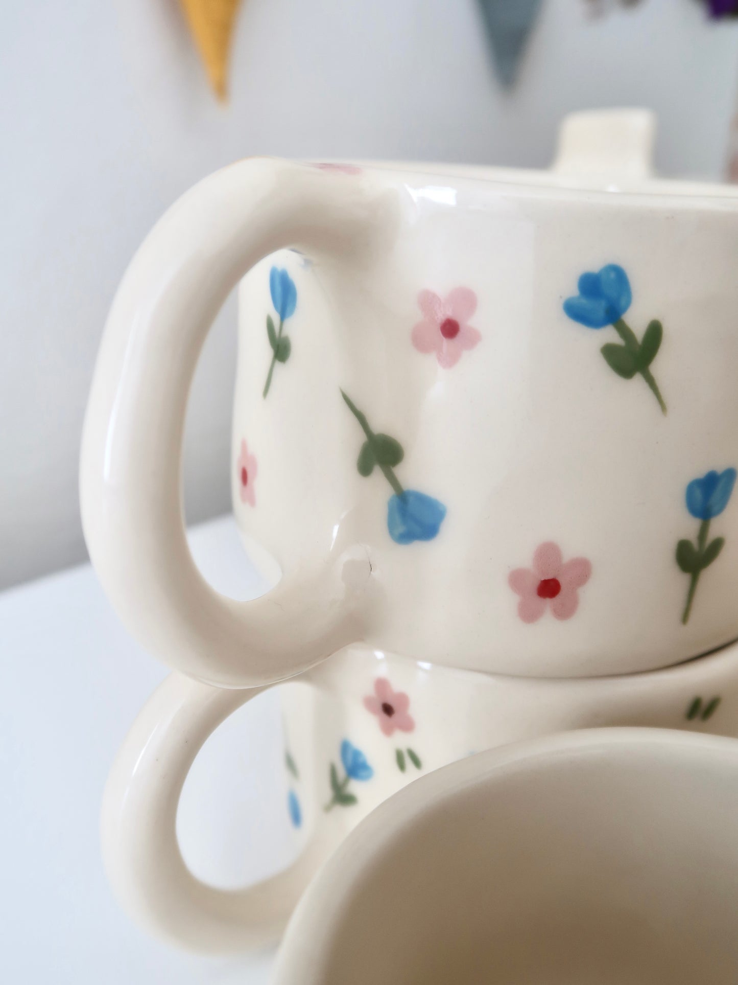 Mug with blue and pink flowers
