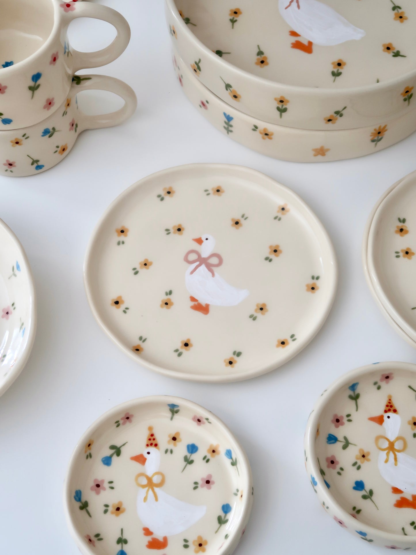 Breakfast/dessert plate with a duck and yellow flowers
