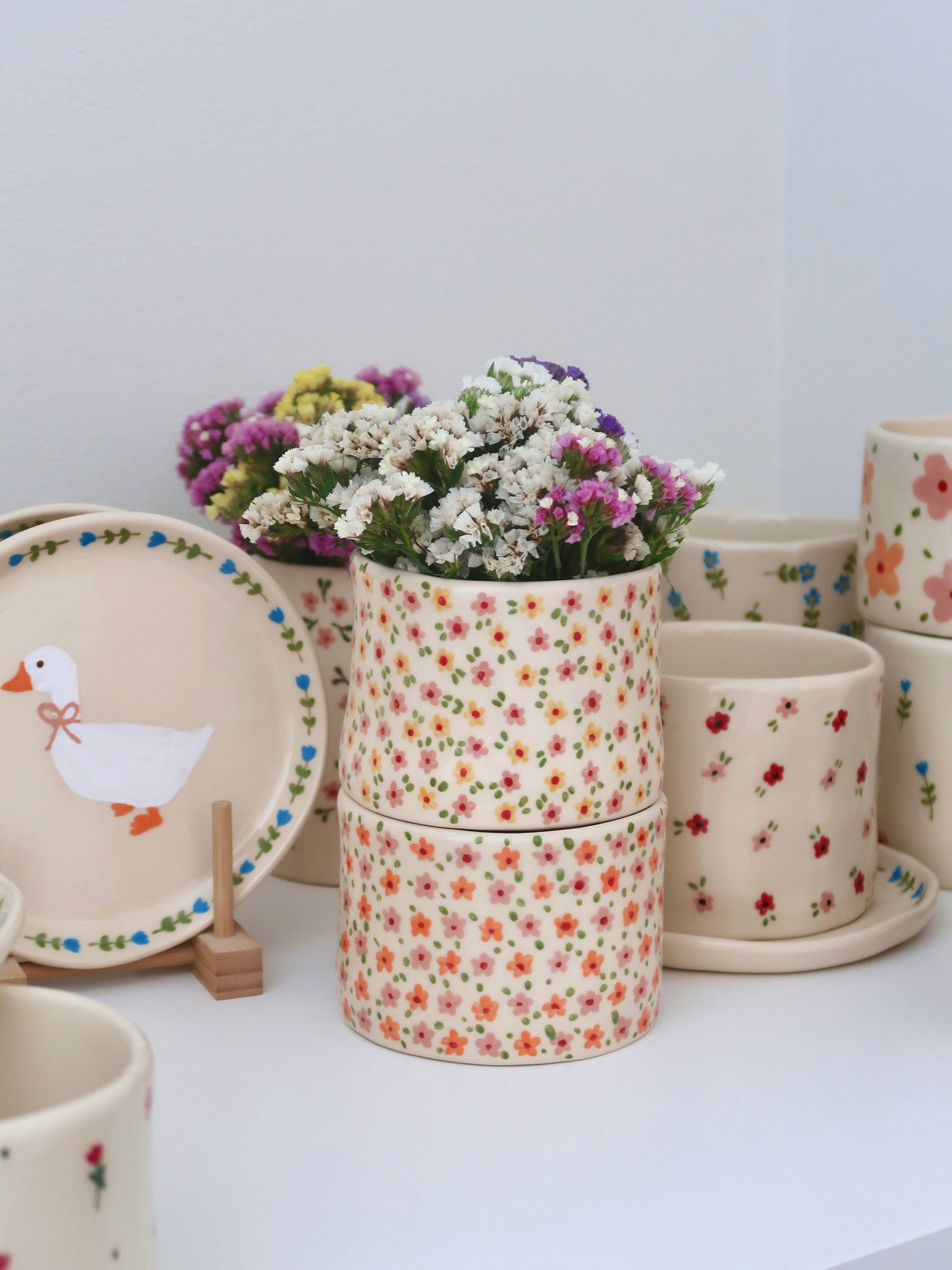 Vase with pink and orange flowers