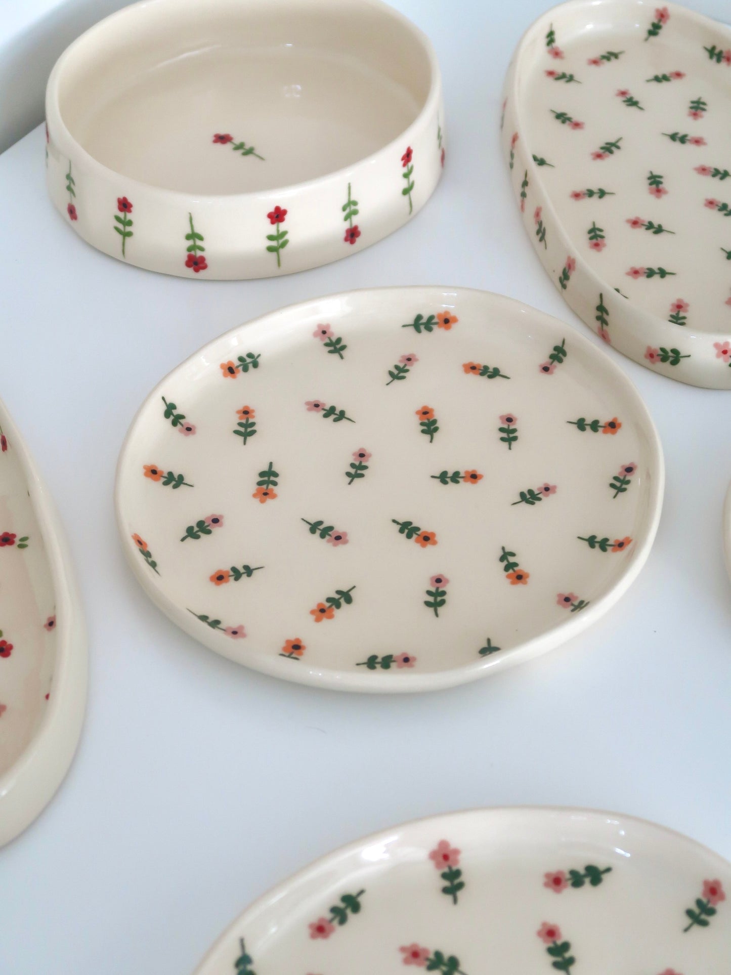 Plate with pink and orange flowers
