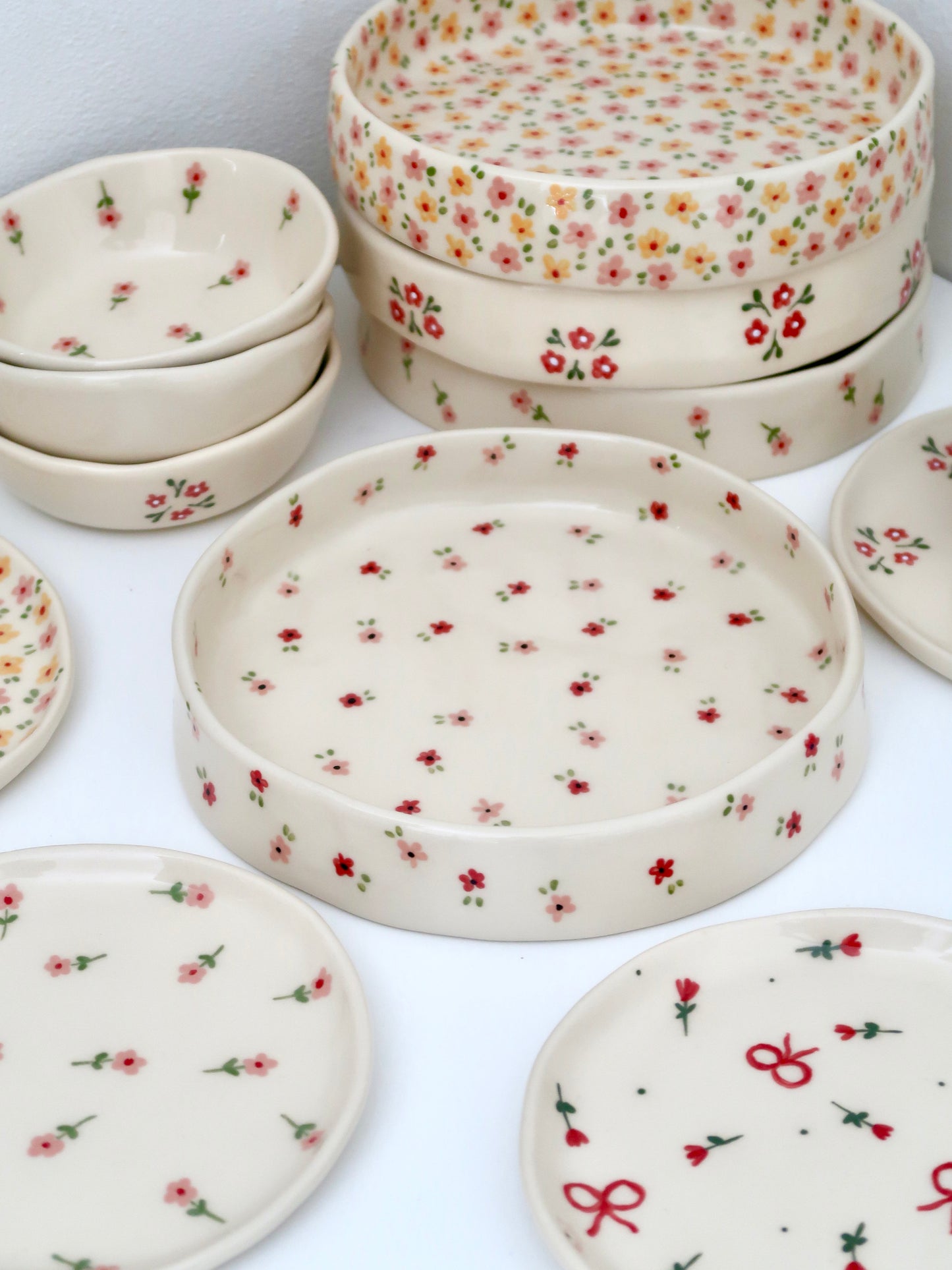 Large bowl with red and pink flowers