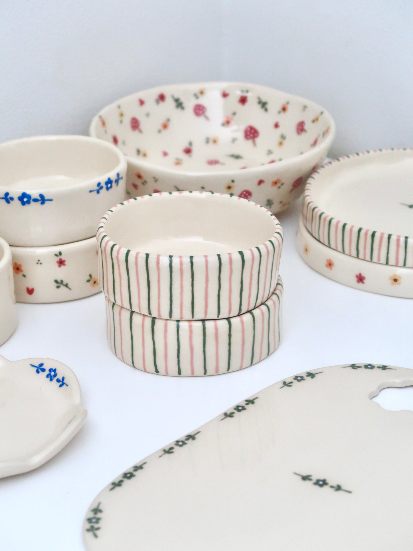 Bowl with green and pink flowers