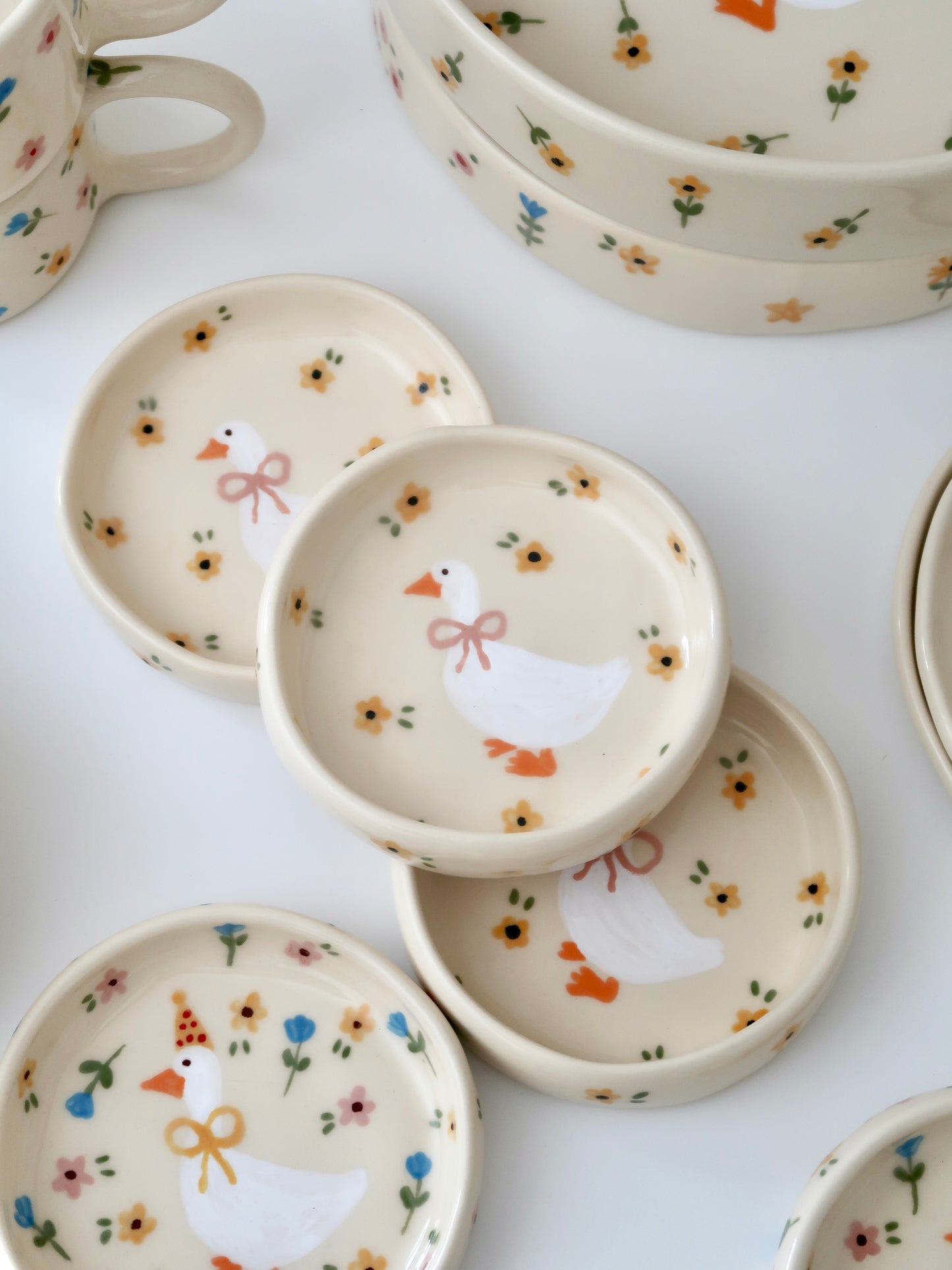 Ring dish with a duck and yellow flowers