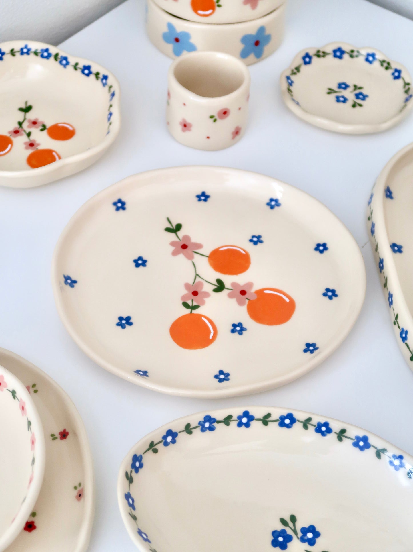 Plate with orange and blue flowers