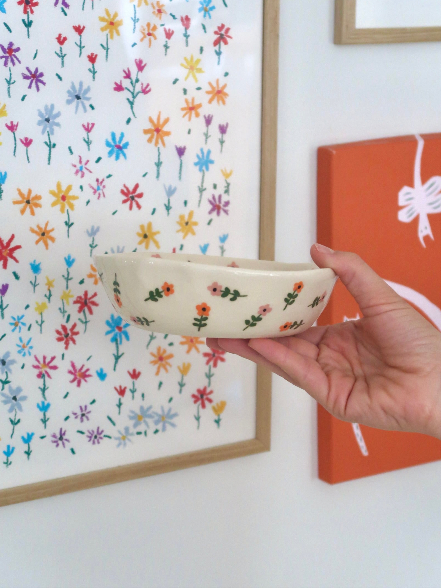 Bowl with pink and orange flowers