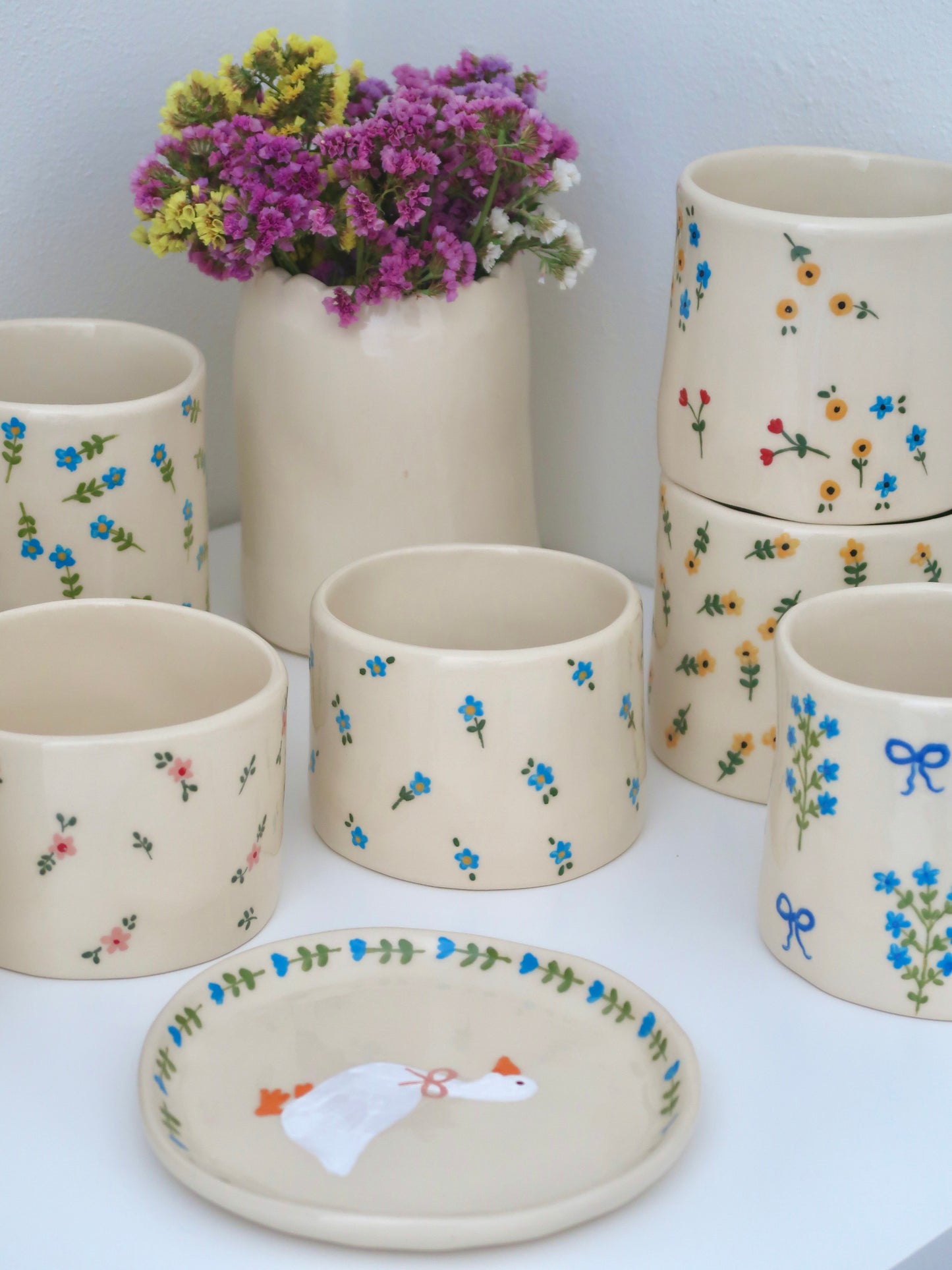 Vase with blue flowers