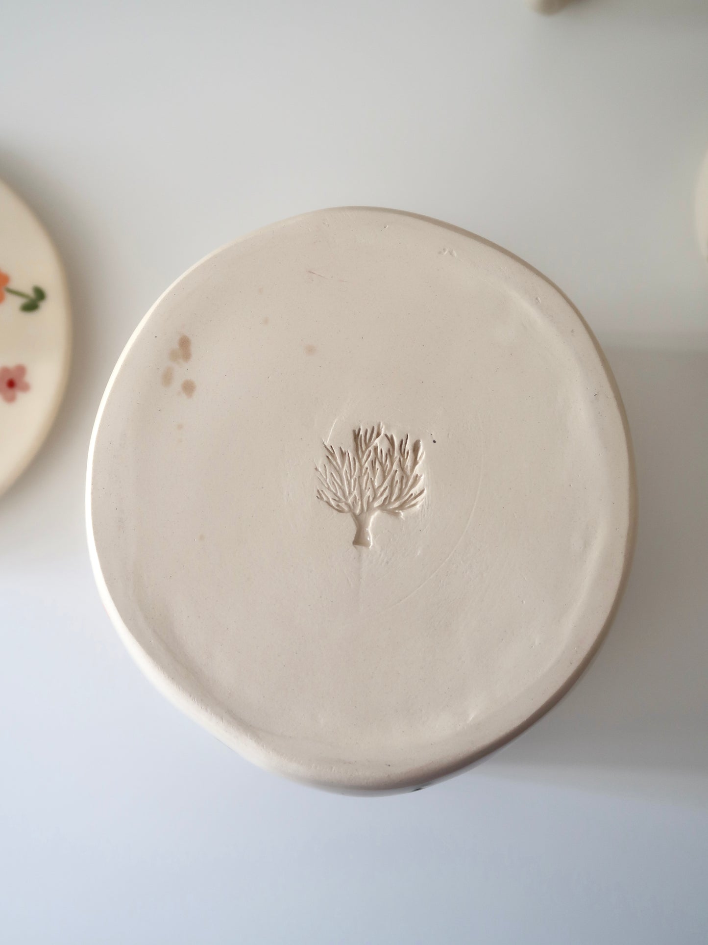 Pot with orange and pink flowers