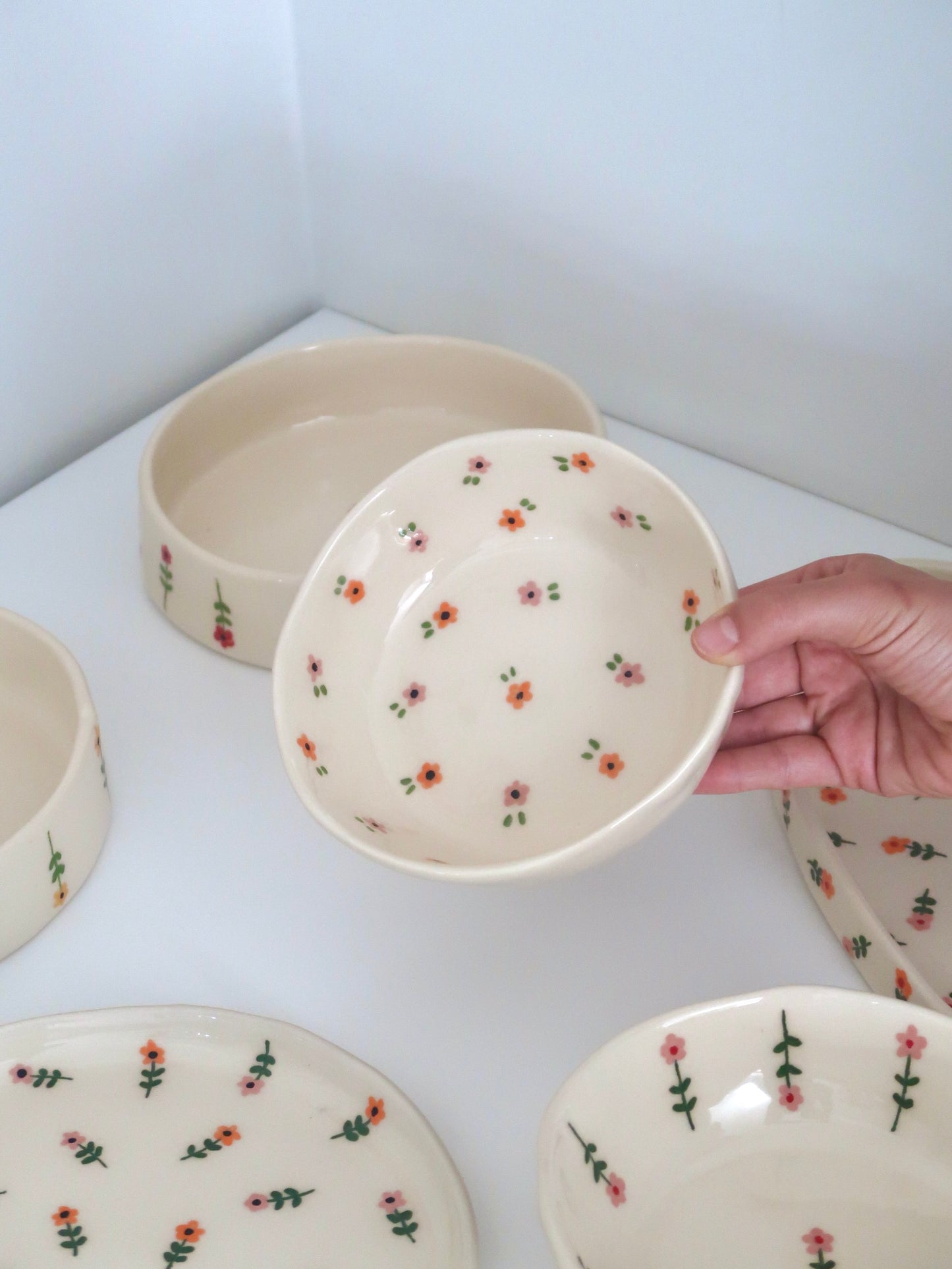 Bowl with pink and orange flowers