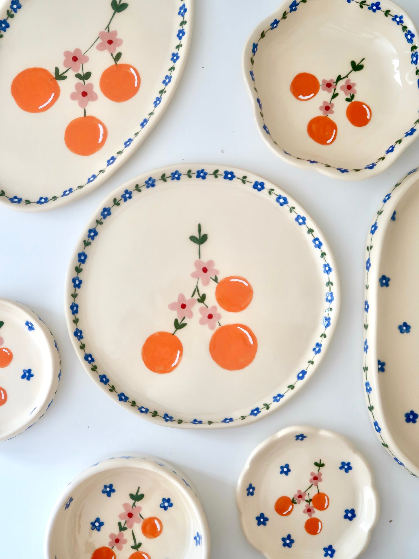 Plate with orange and blue flowers