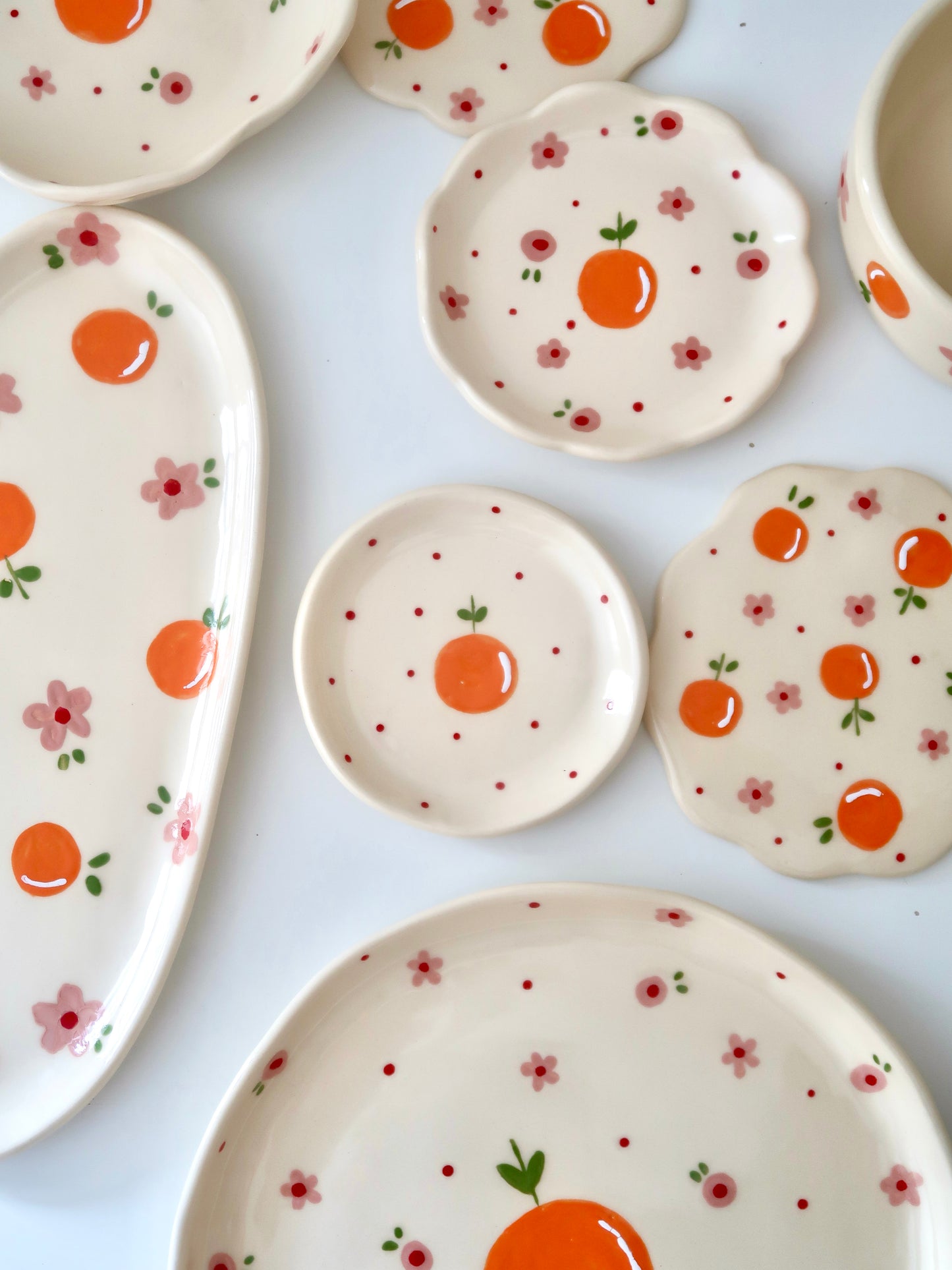 Ring dish with orange and red dots