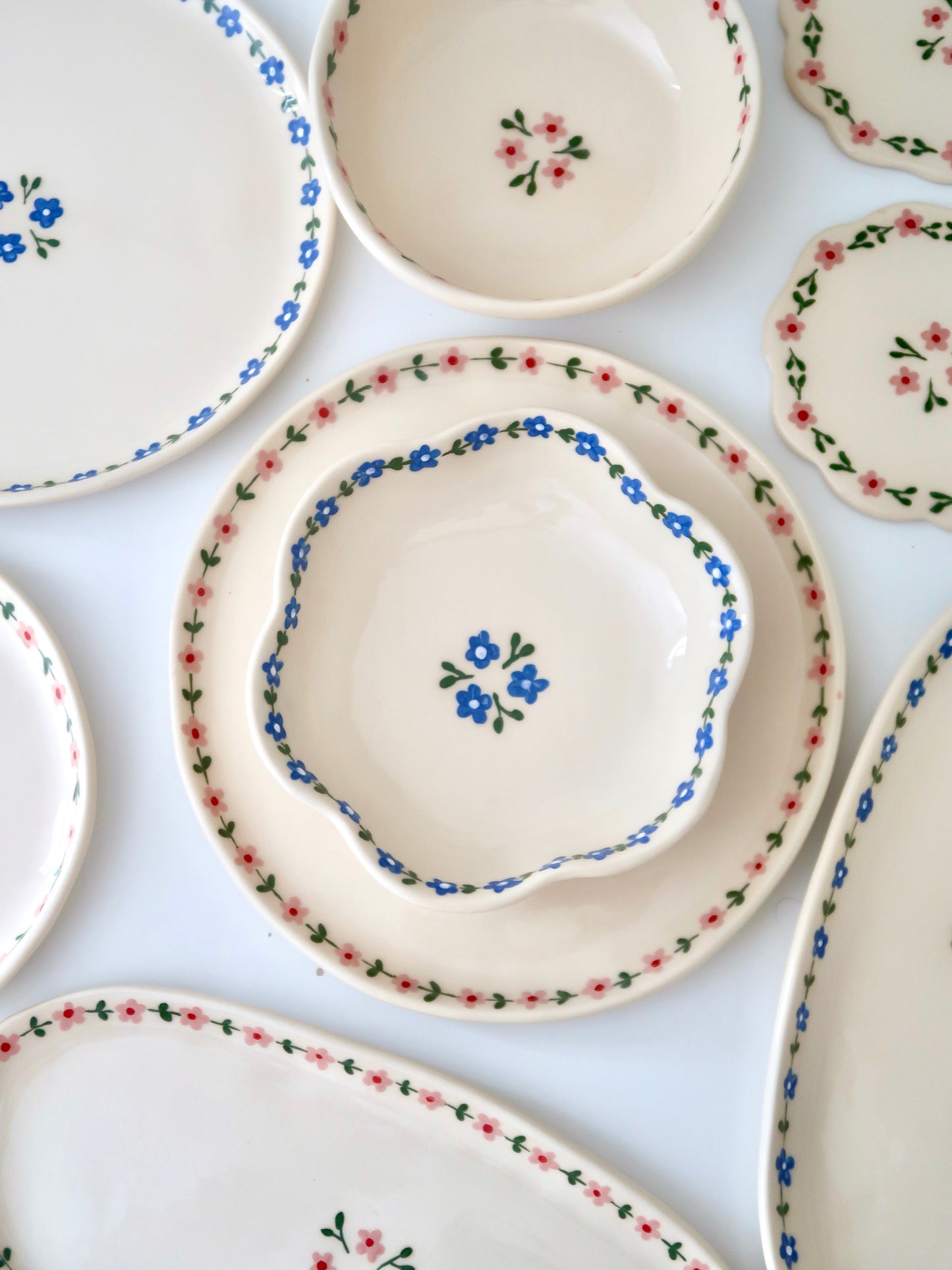 Scalloped bowl with blue flowers flowers