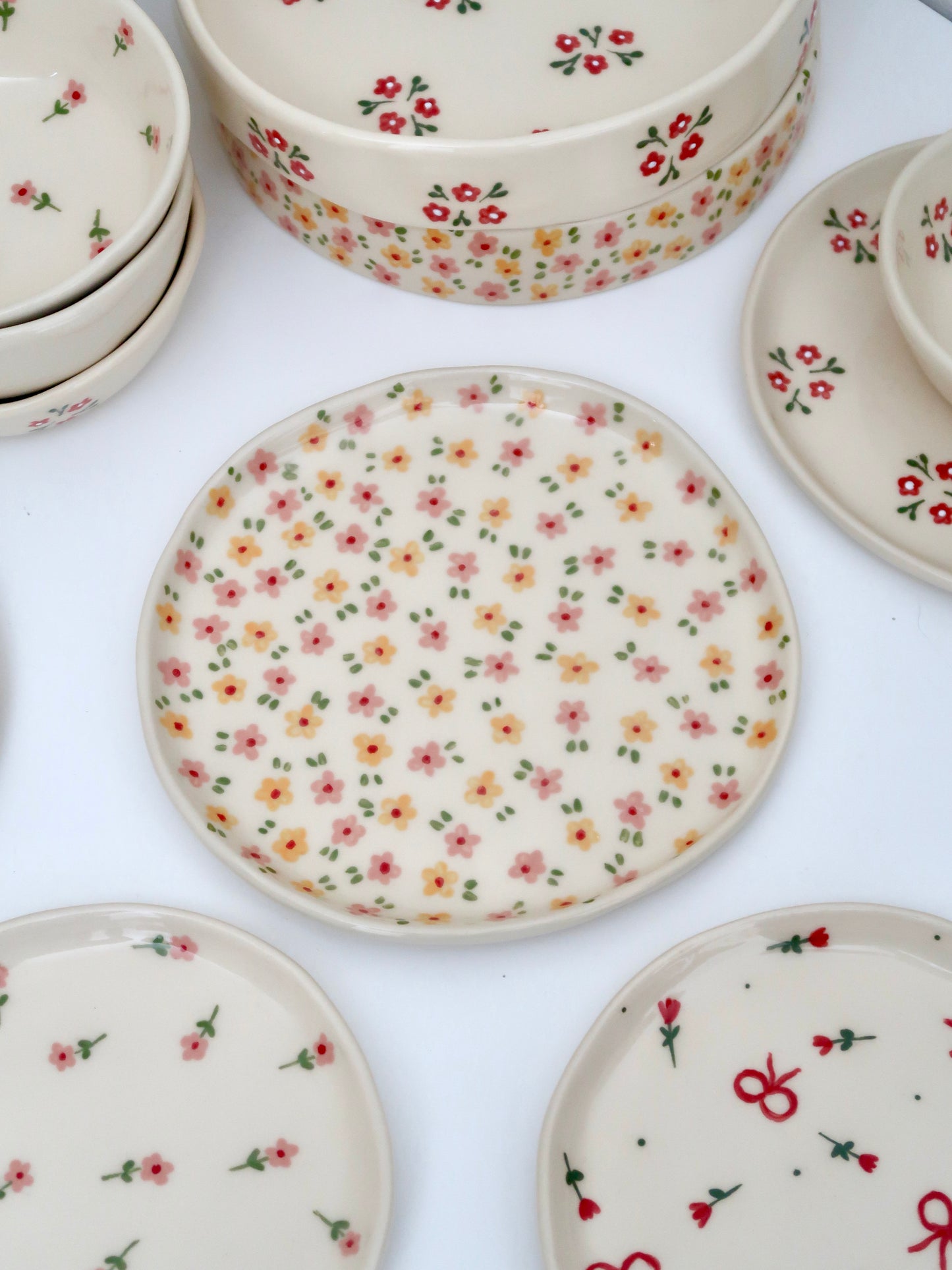 Plate with pink and yellow flowers