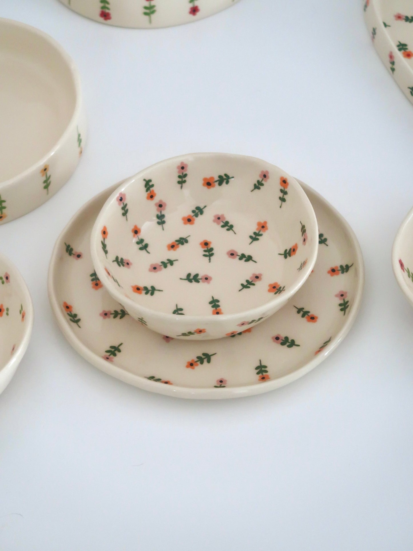 Bowl with pink and orange flowers
