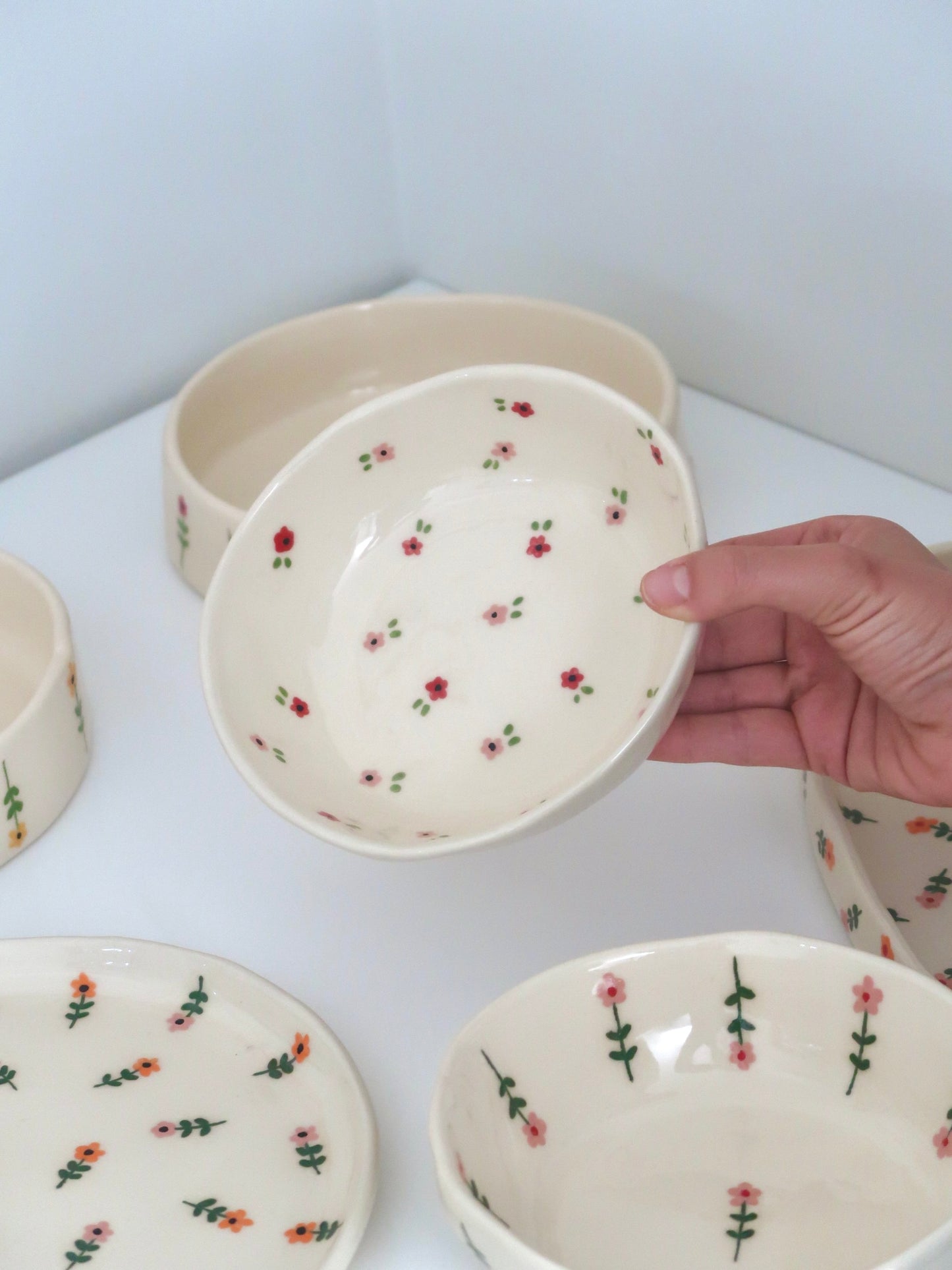 Bowl with pink and red flowers