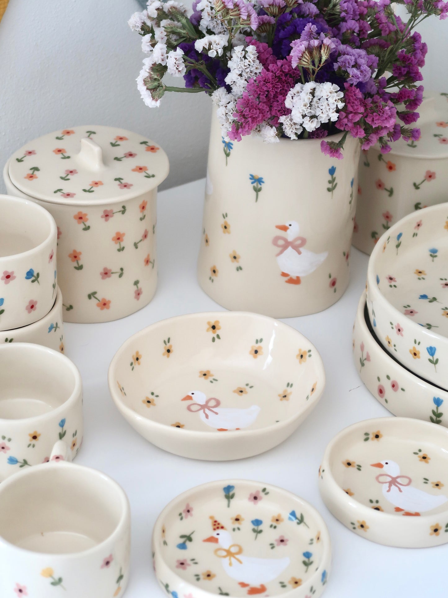 Bowl with a duck and yellow flowers