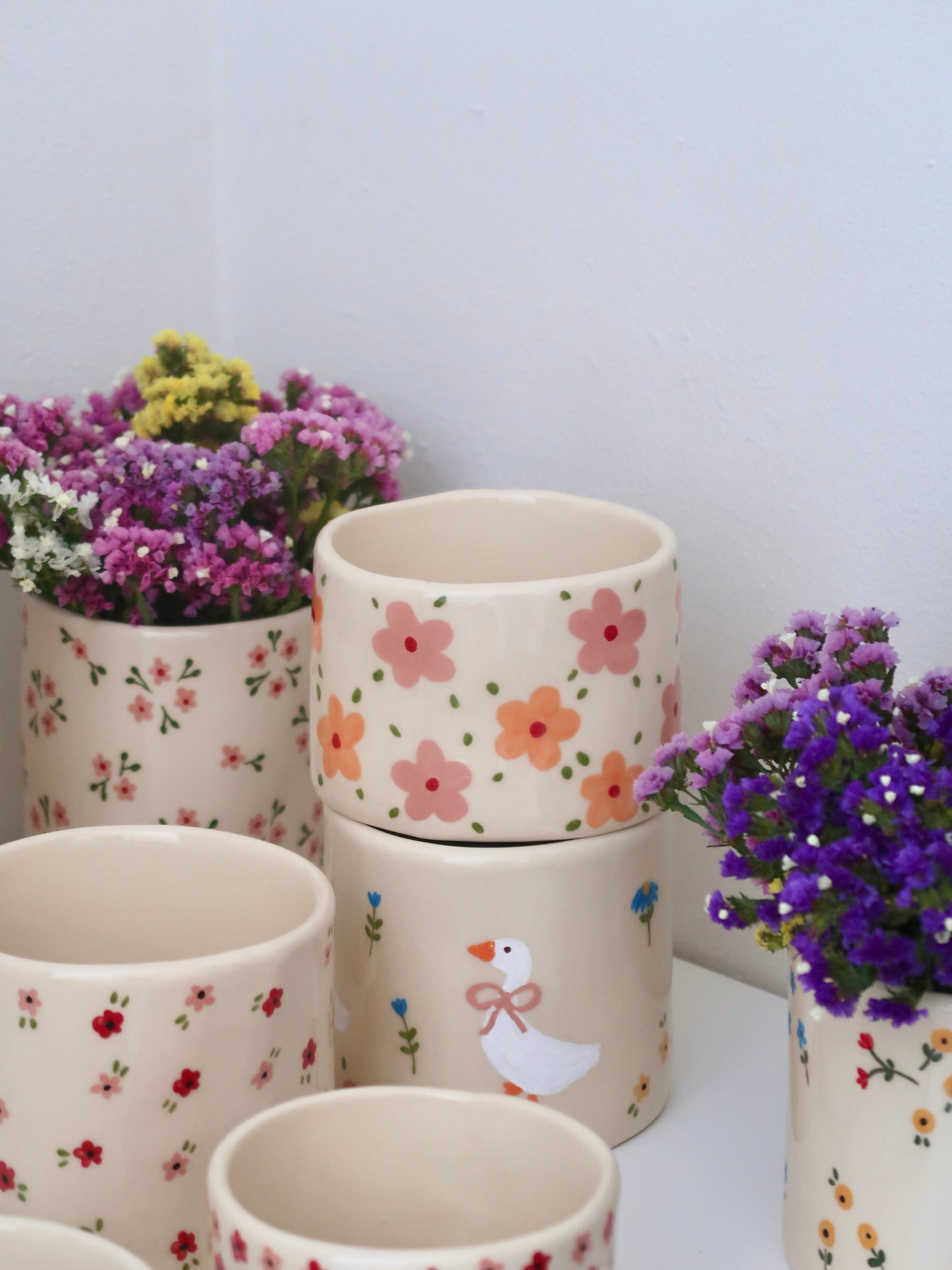 Vase with pink and orange flowers