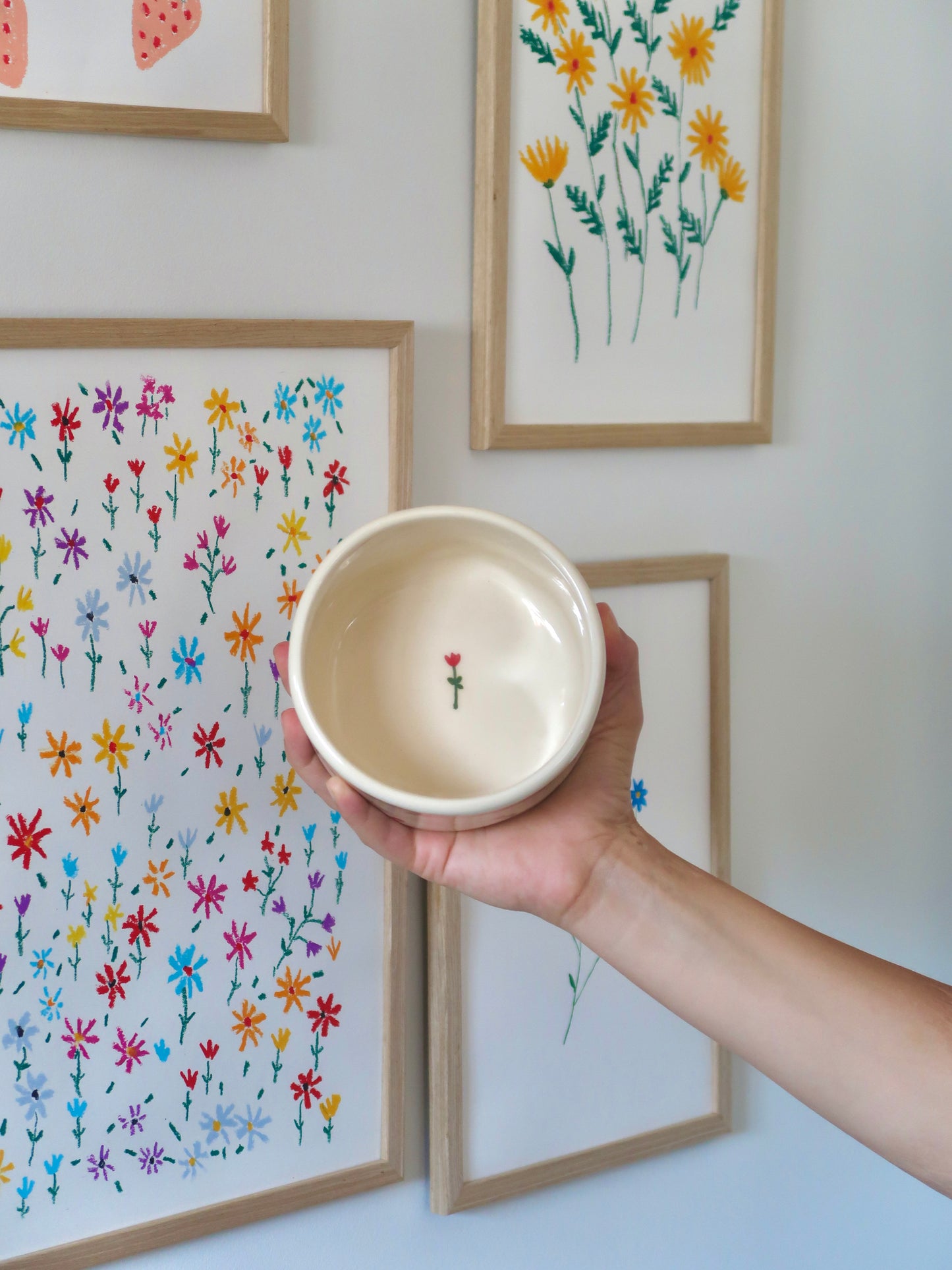 Vase with red flowers and bows