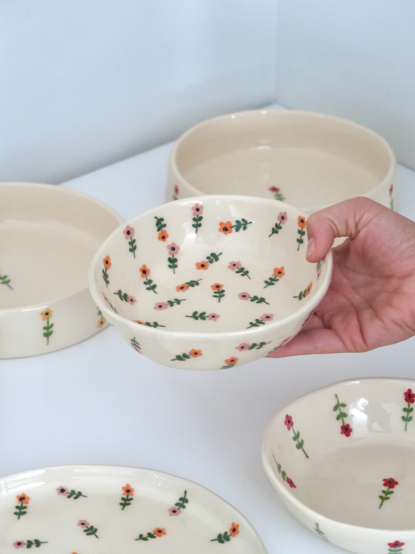 Bowl with pink and orange flowers