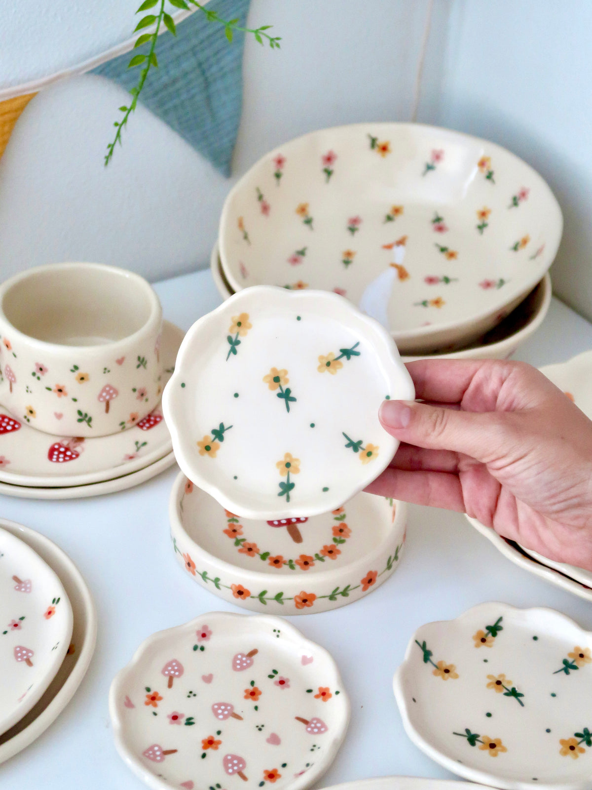 Scalloped ring dish with yellow flowers and green dots