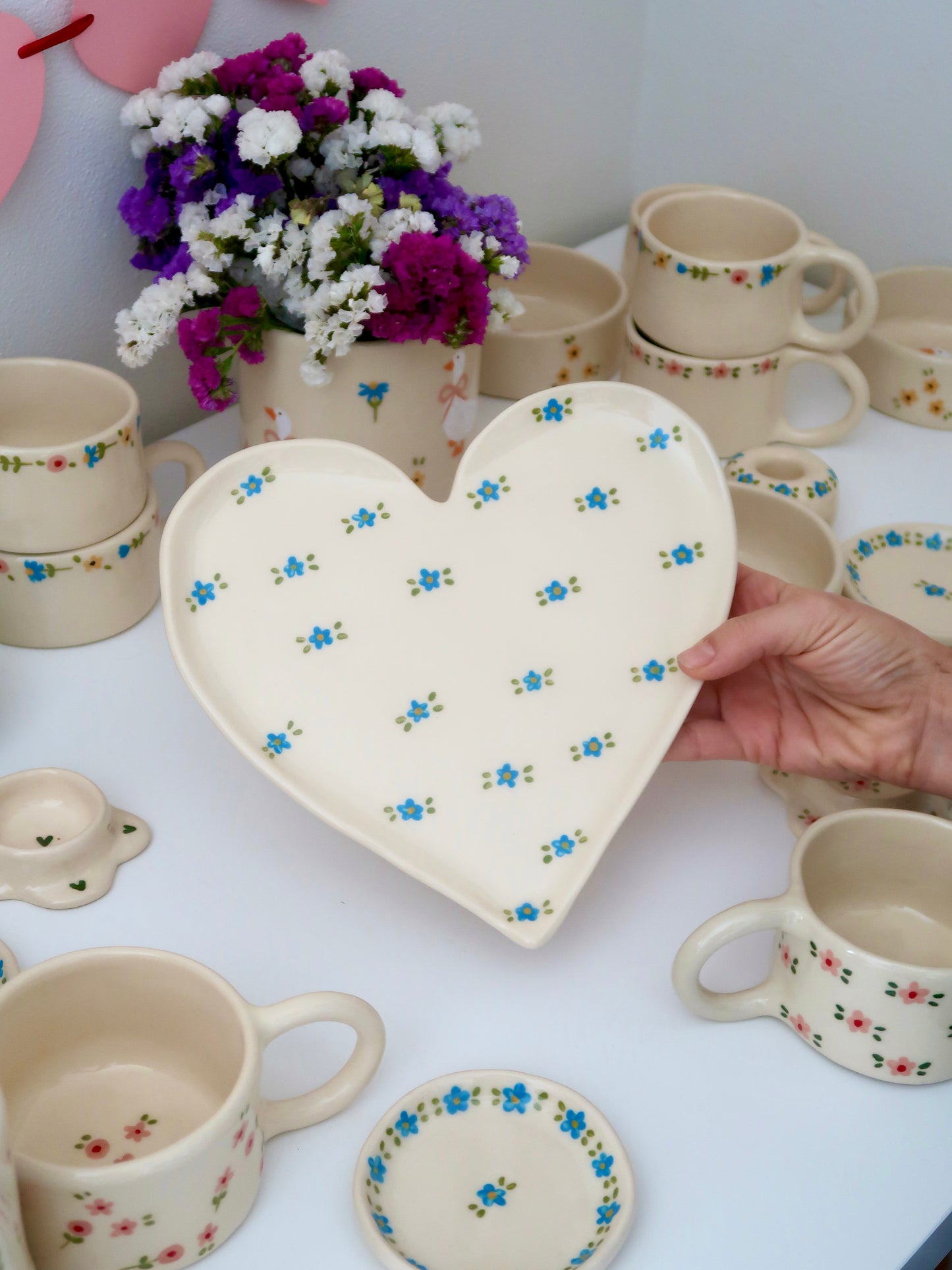 Large heart shaped plate with blue flowers (small imperfection)