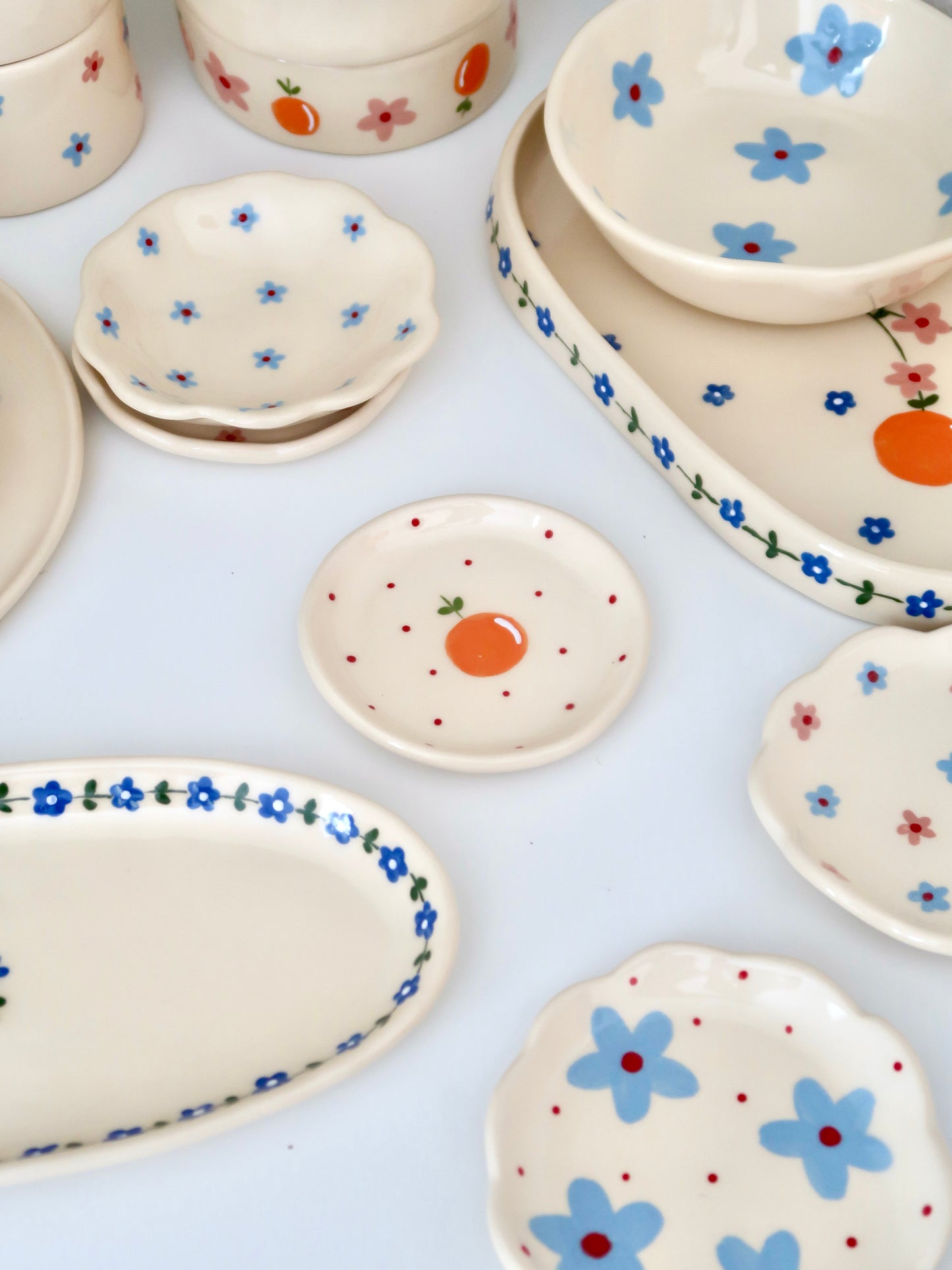 Ring dish with orange and red dots