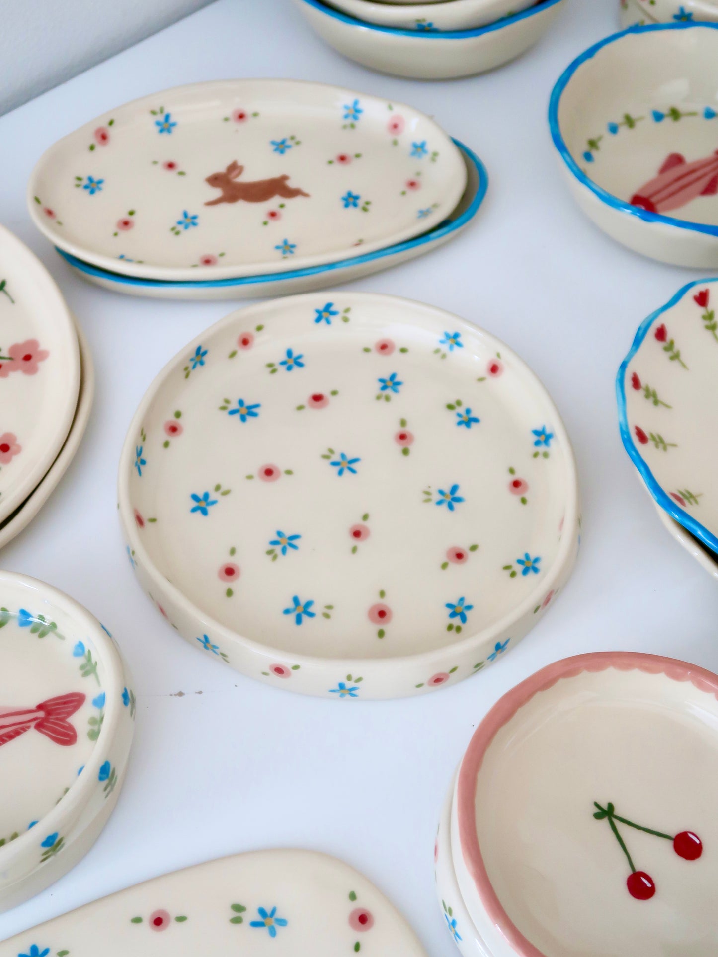 High edge plate with pink and blue flowers