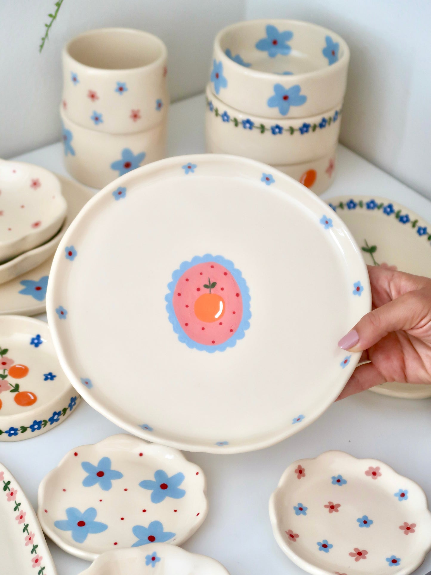 Plate with orange and blue flowers