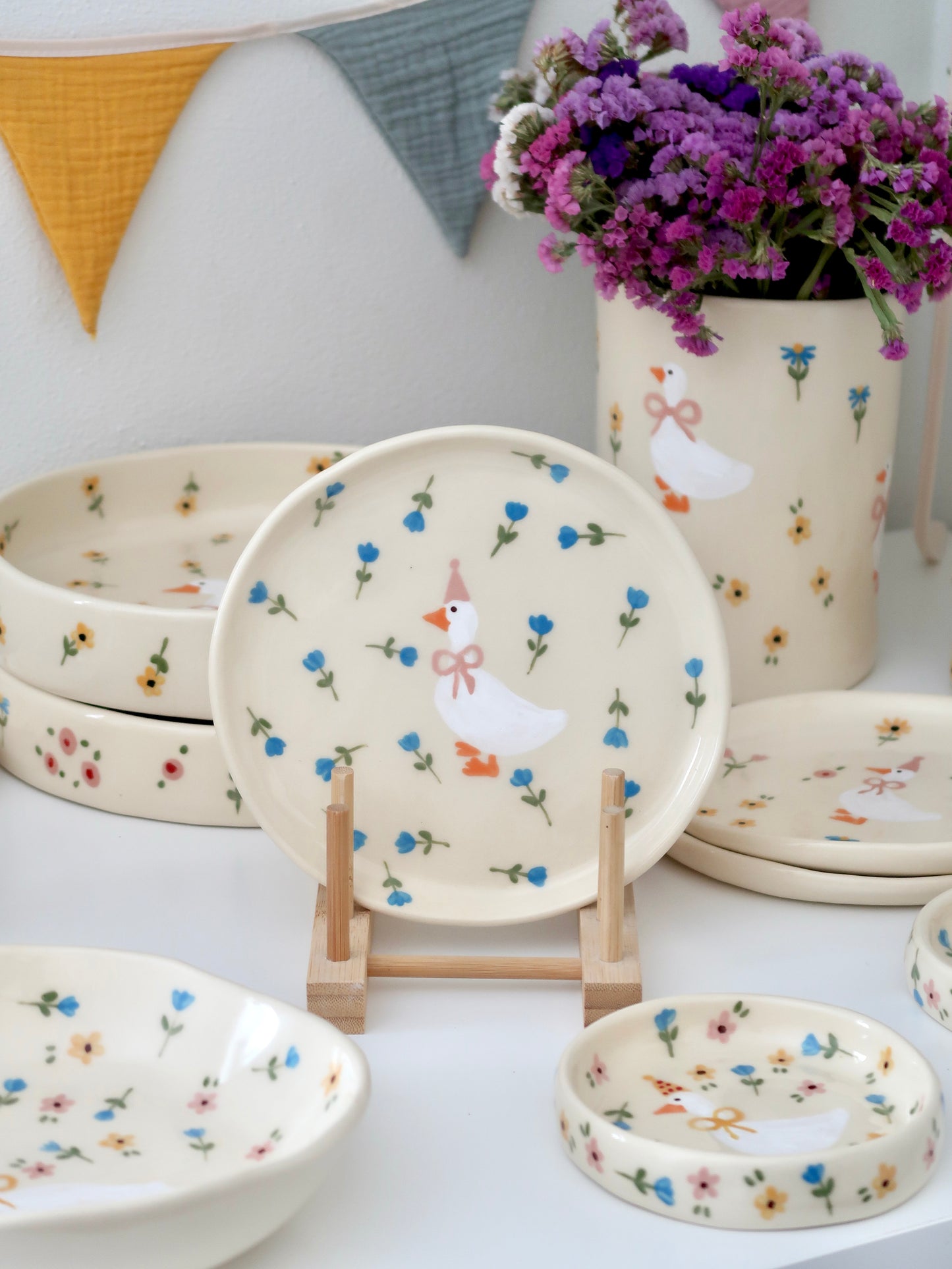Breakfast/dessert plate with a duck with blue flowers