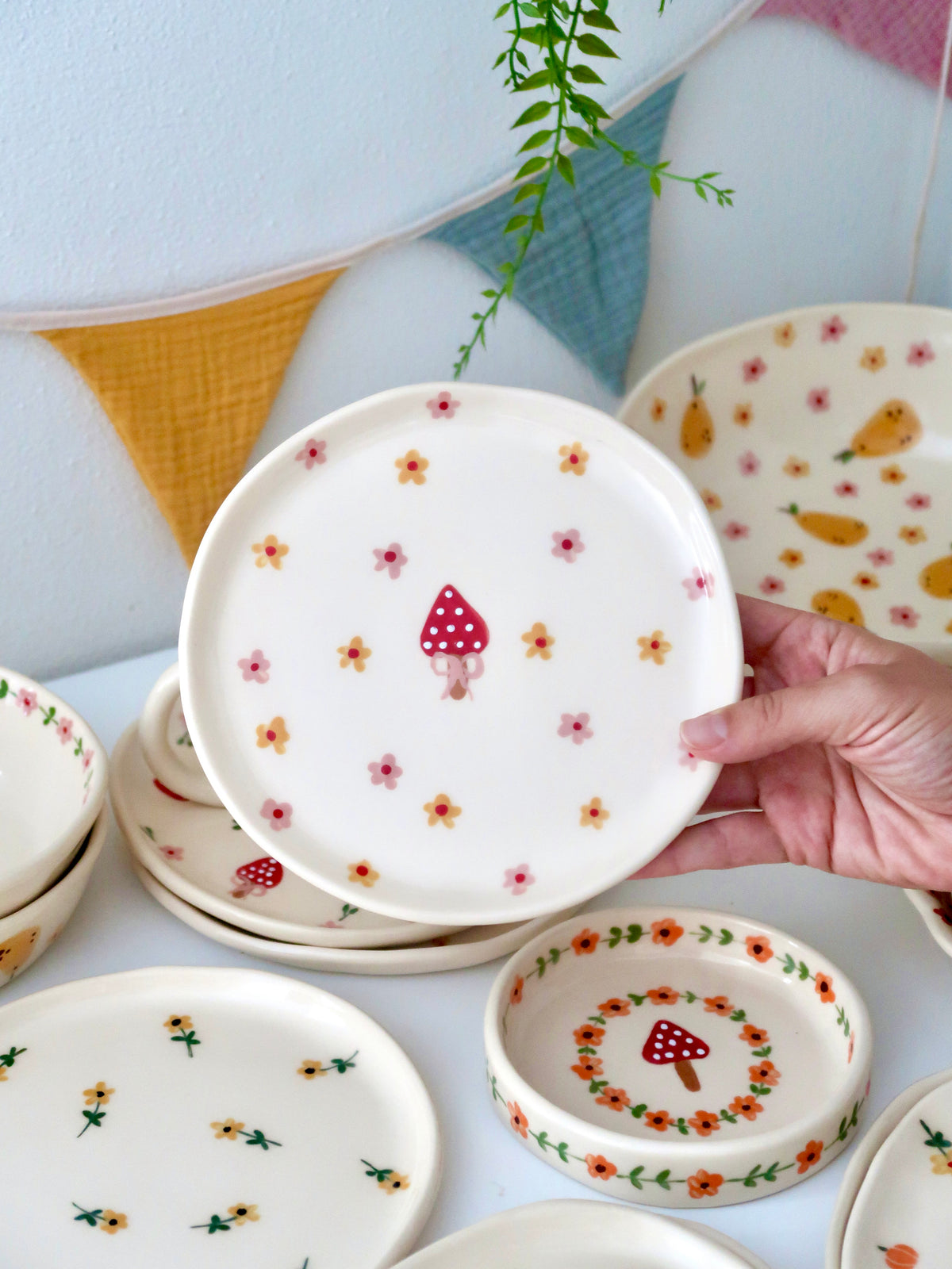 Breakfast/Dessert plate with a mushroom and pink and yellow flowers