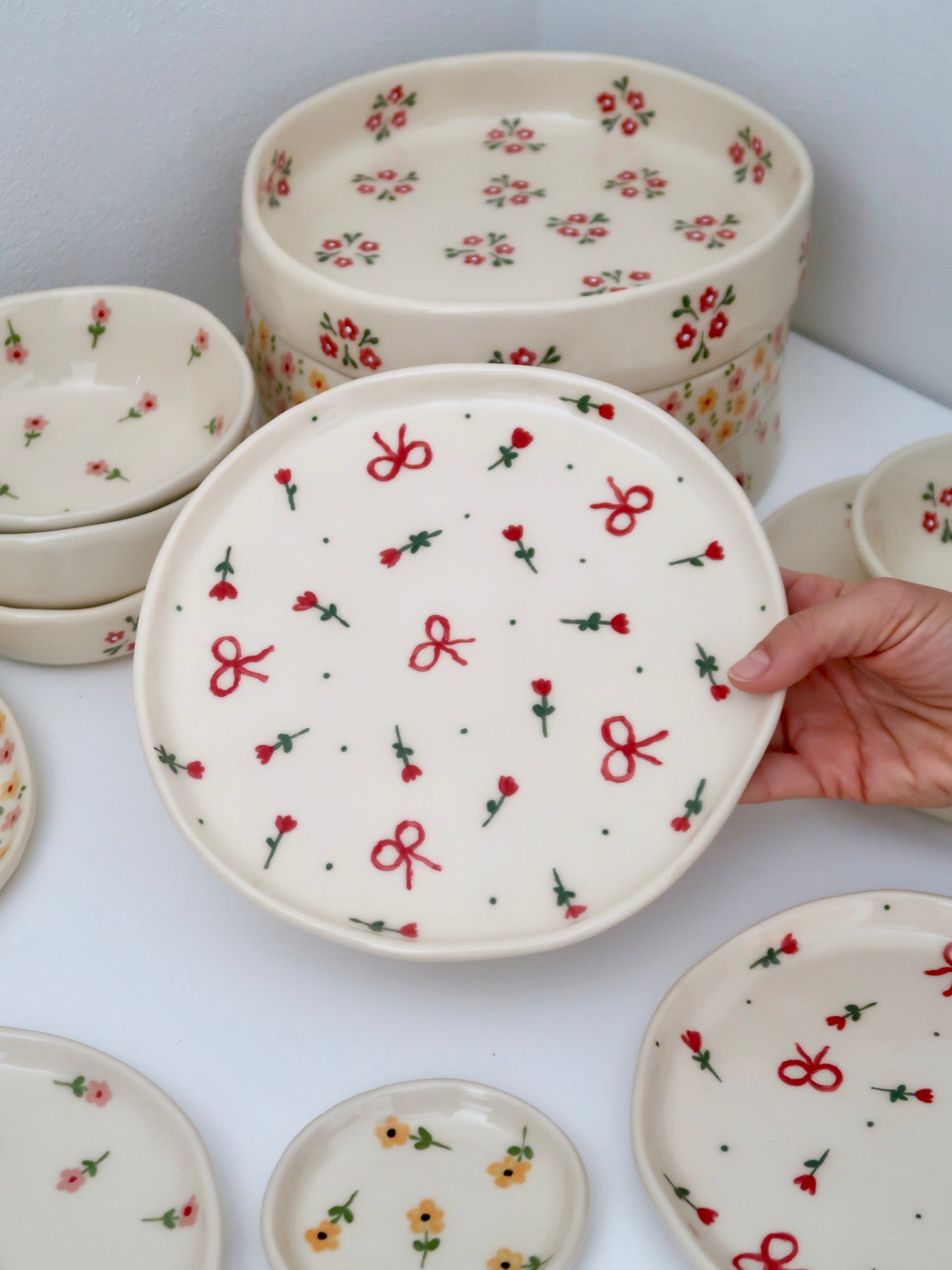 Plate with red flowers and bows