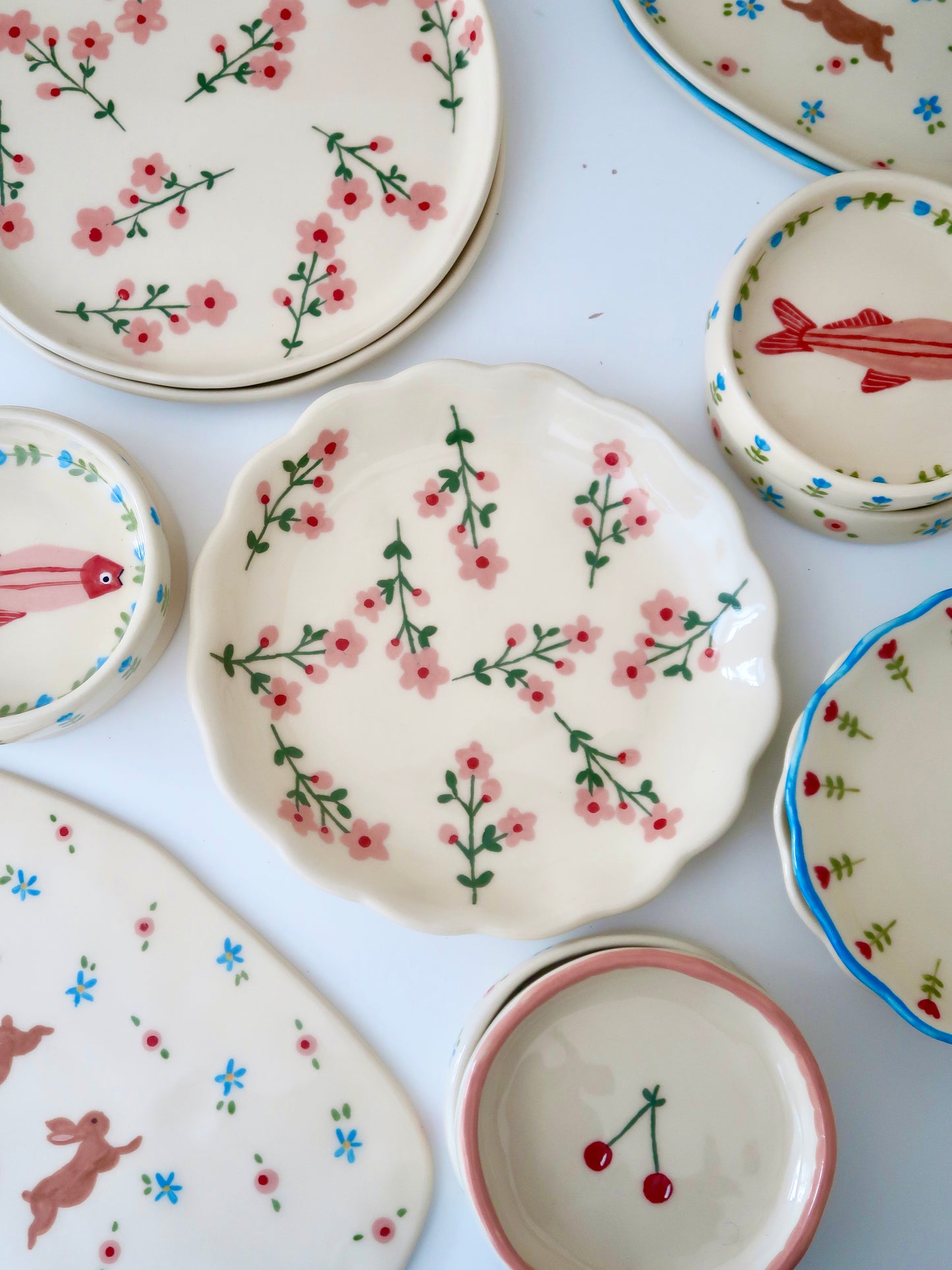 Scalloped plate with pink flowers