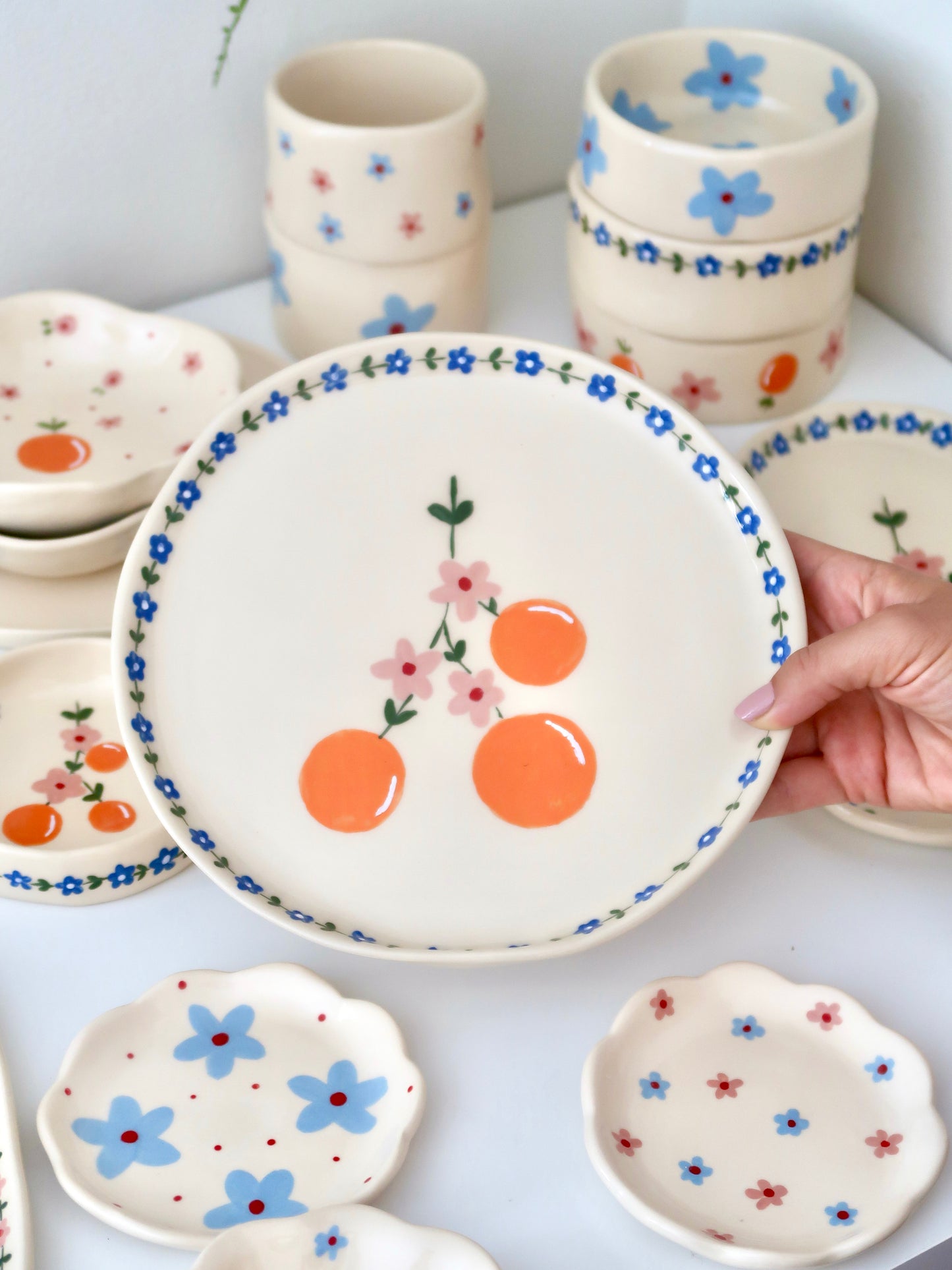 Plate with orange and blue flowers