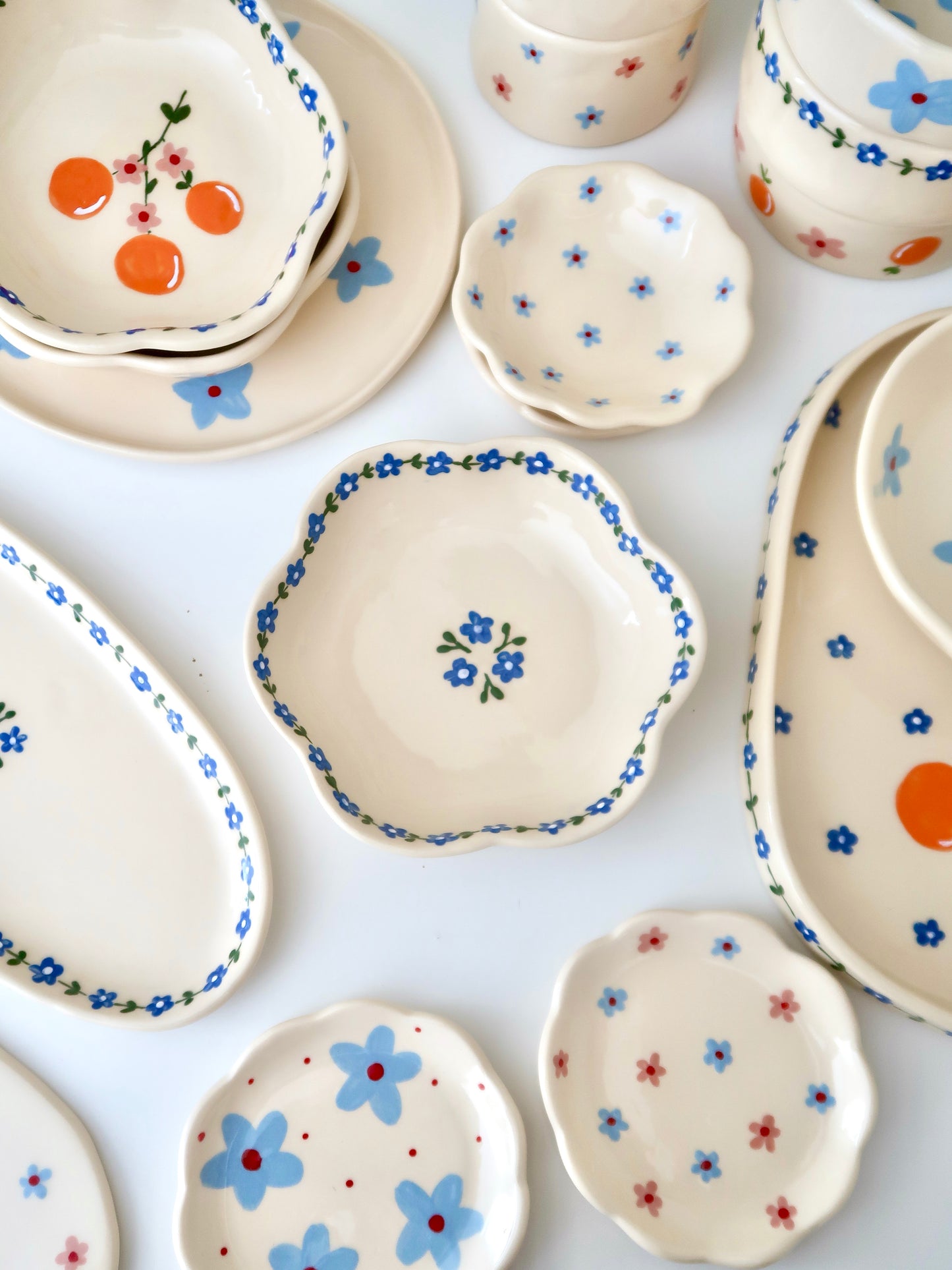 Scalloped bowl with blue flowers flowers