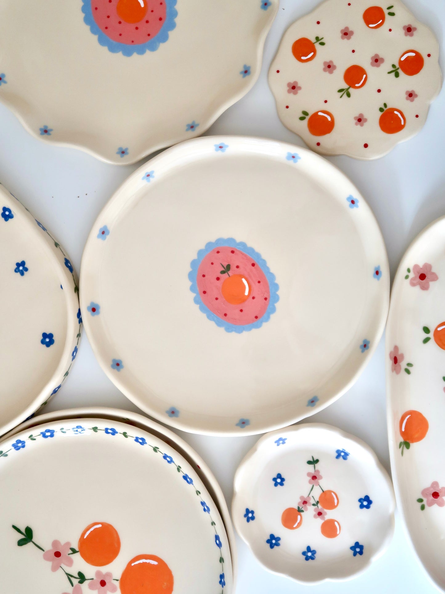 Plate with orange and blue flowers