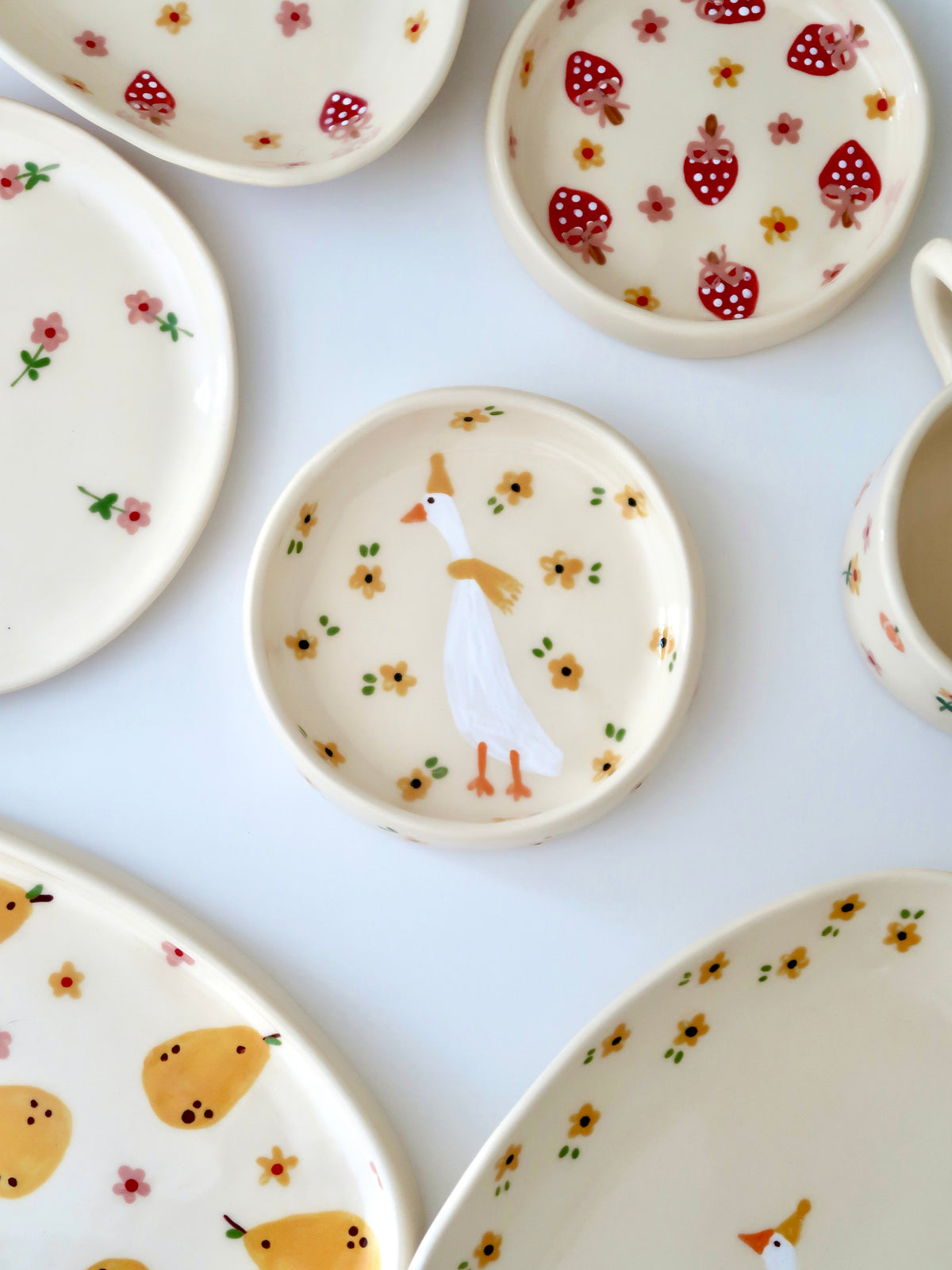 Ring dish with a duck and yellow flowers