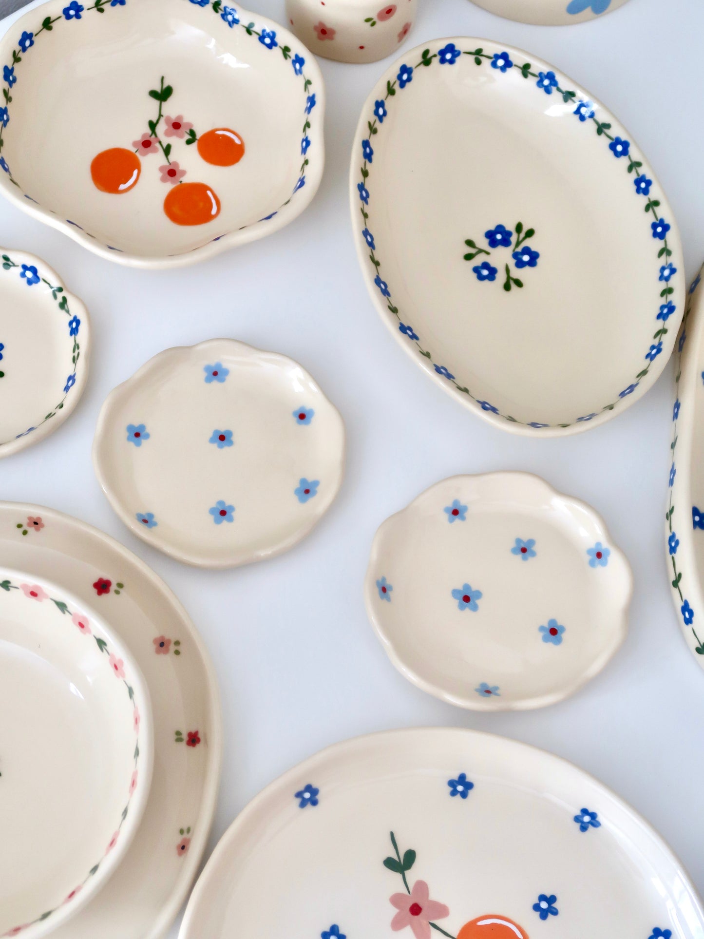 Scalloped ring dish with blue flowers