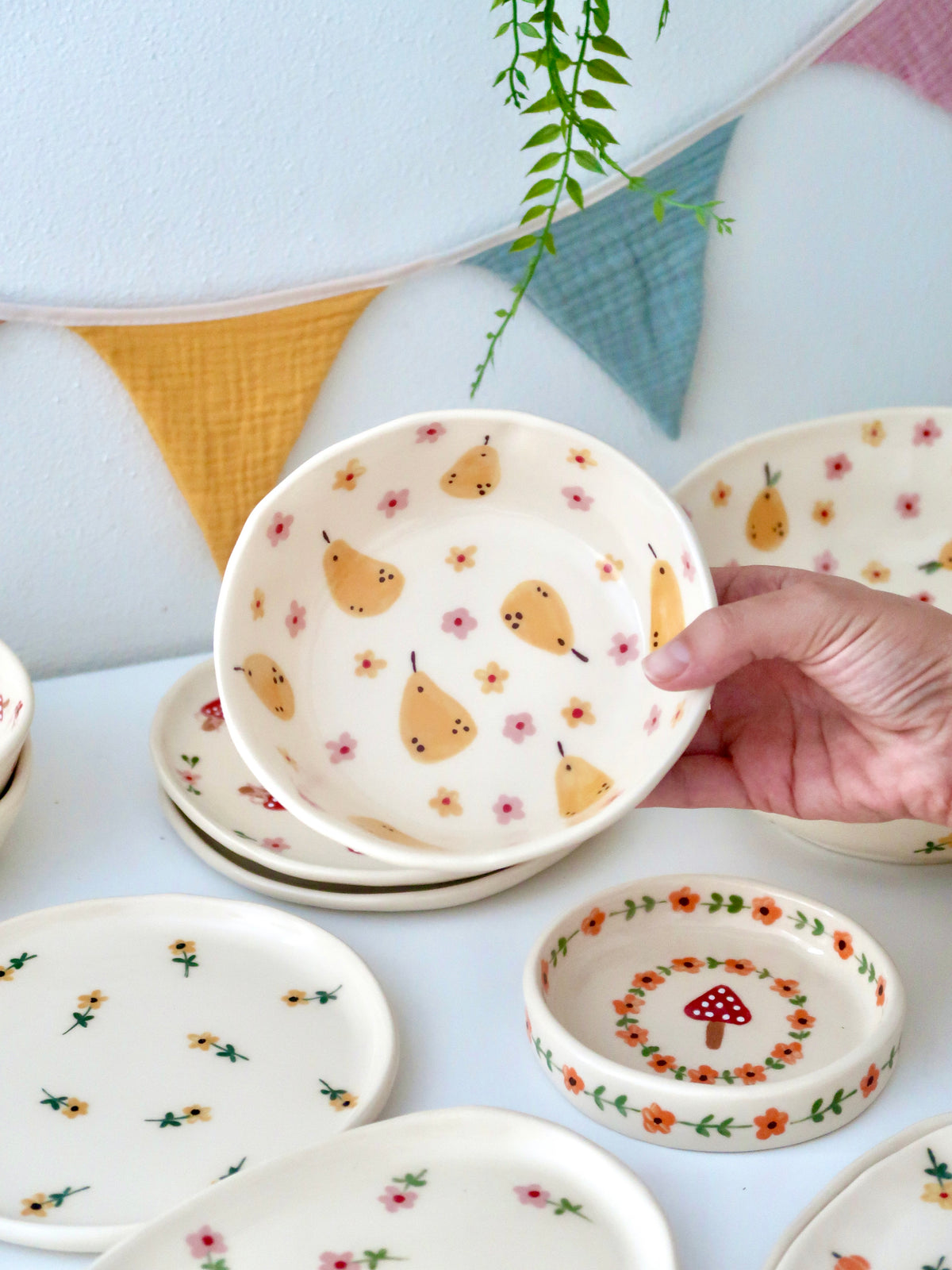 Bowl with pears, yellow and pink flowers