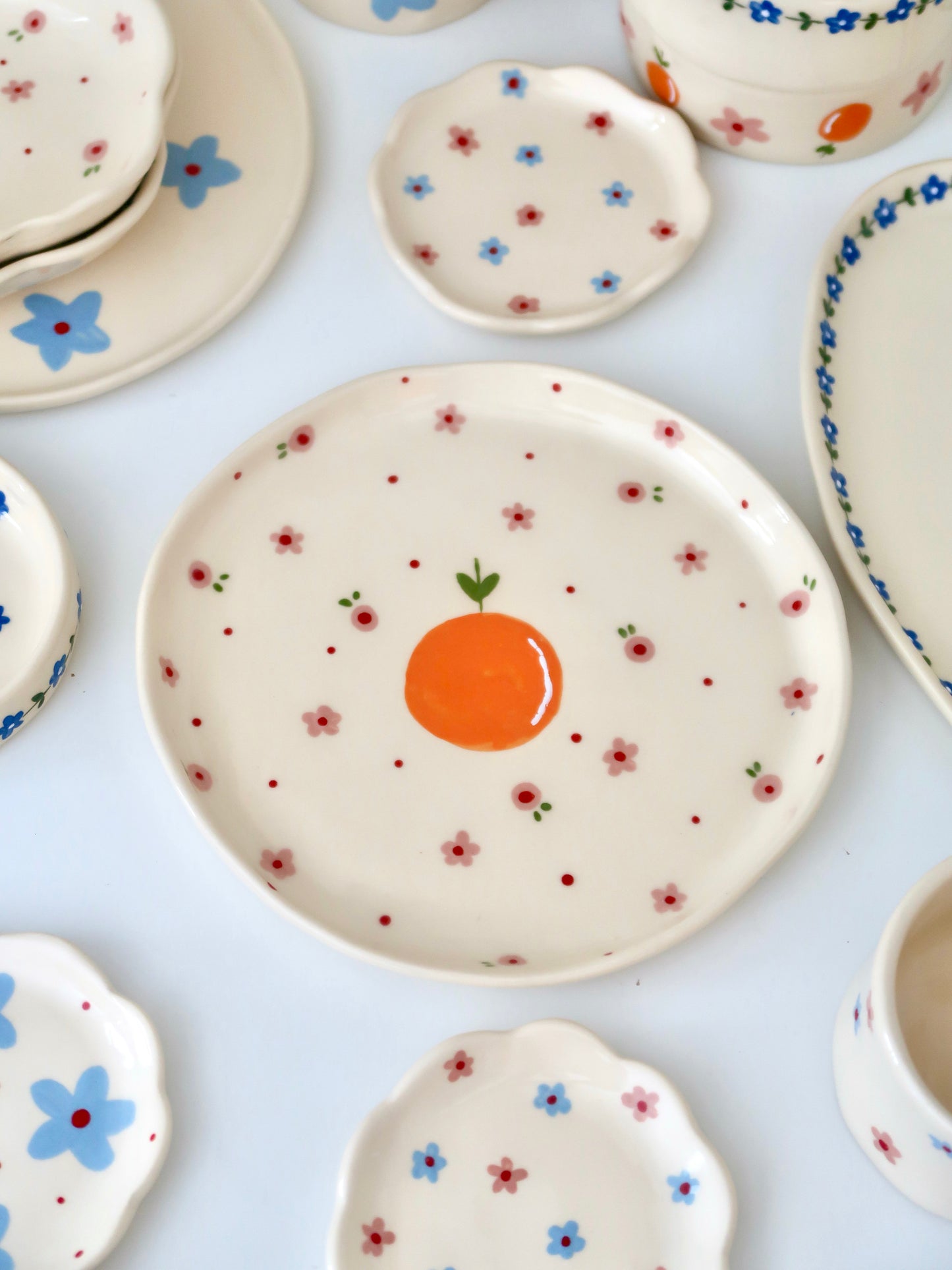 Plate with orange and pink flowers