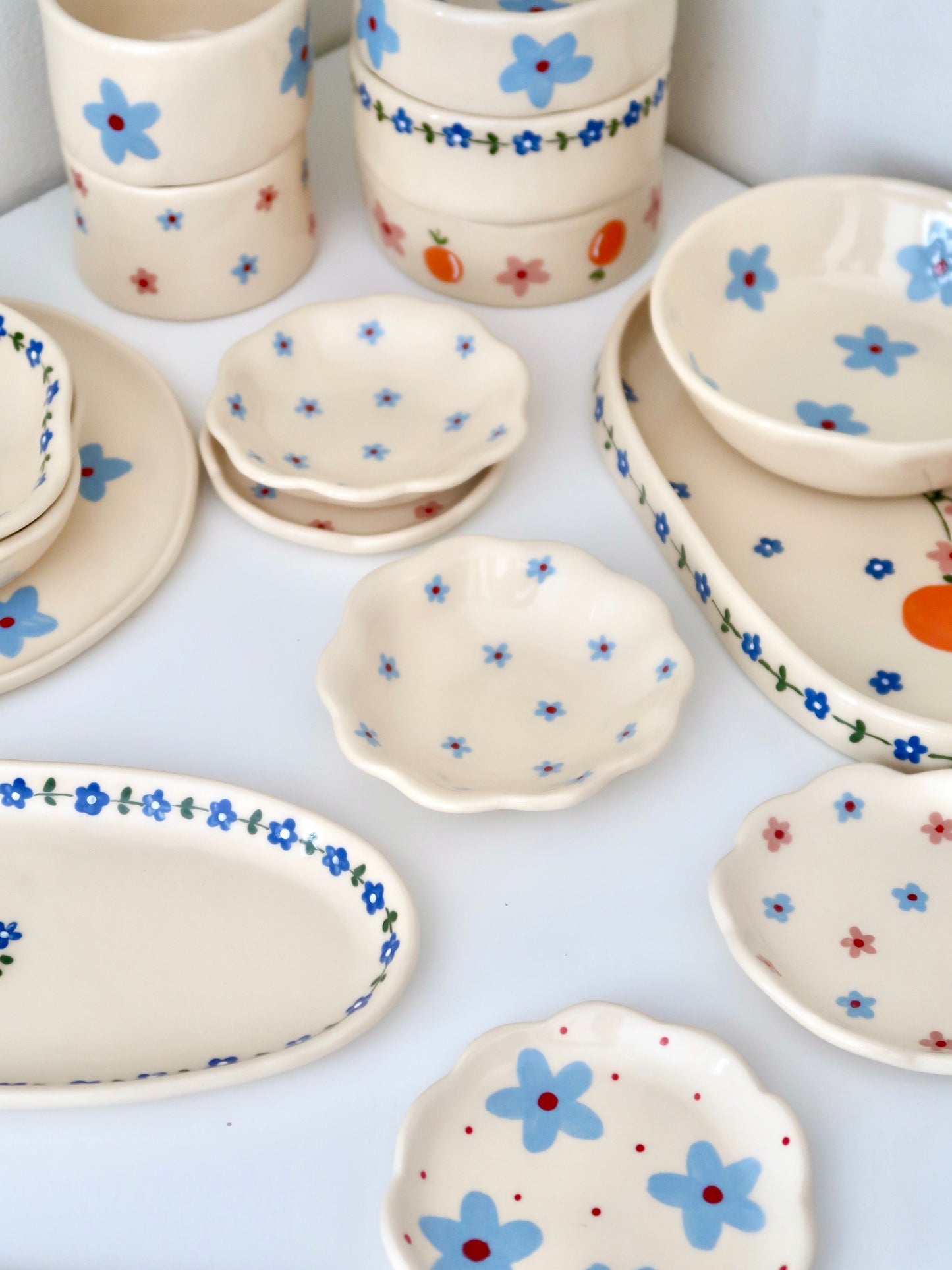 Scalloped ring dish with blue flowers