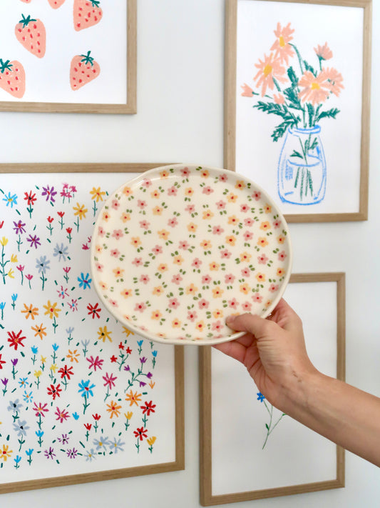 Plate with pink and yellow flowers