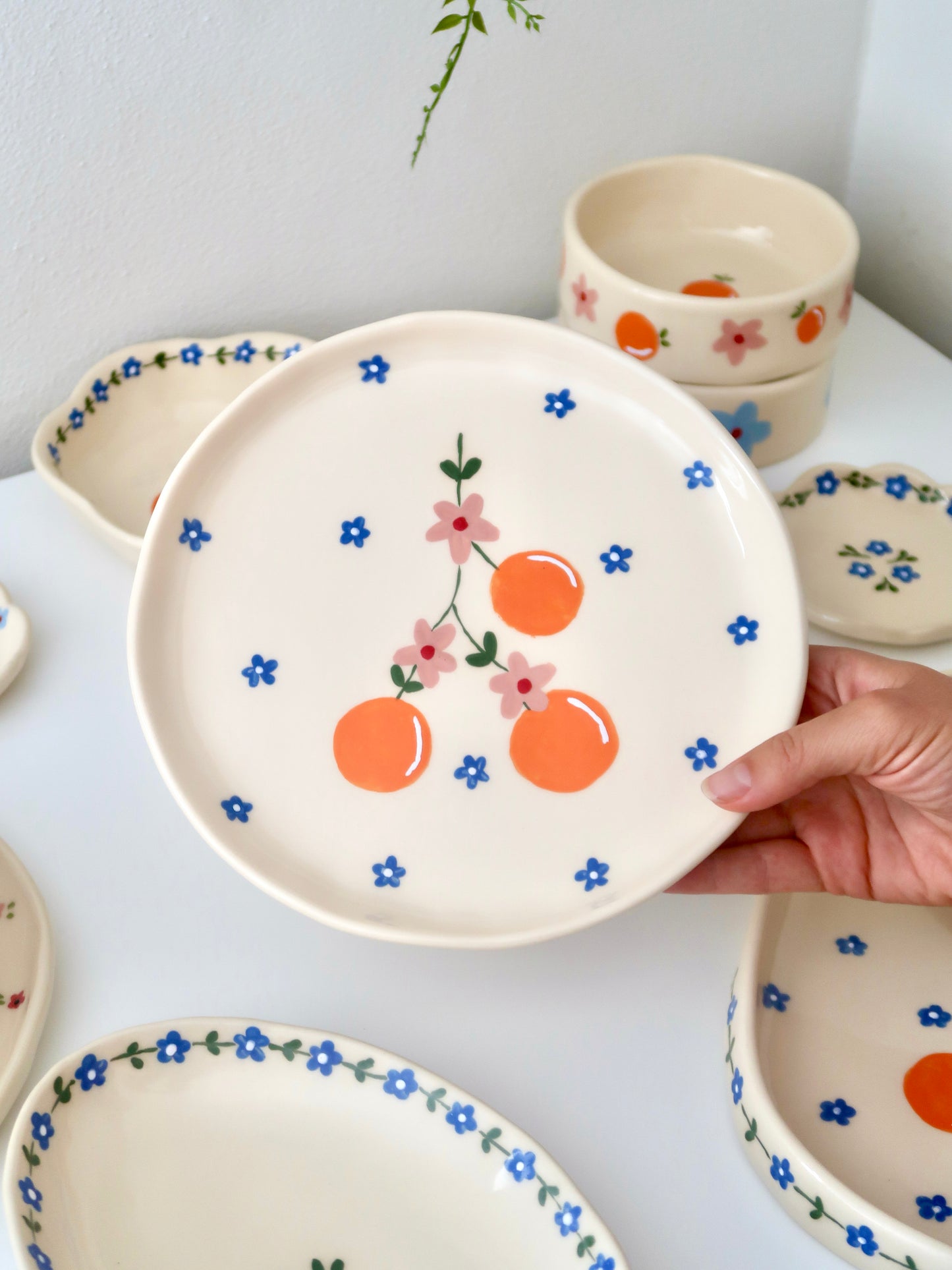 Plate with orange and blue flowers