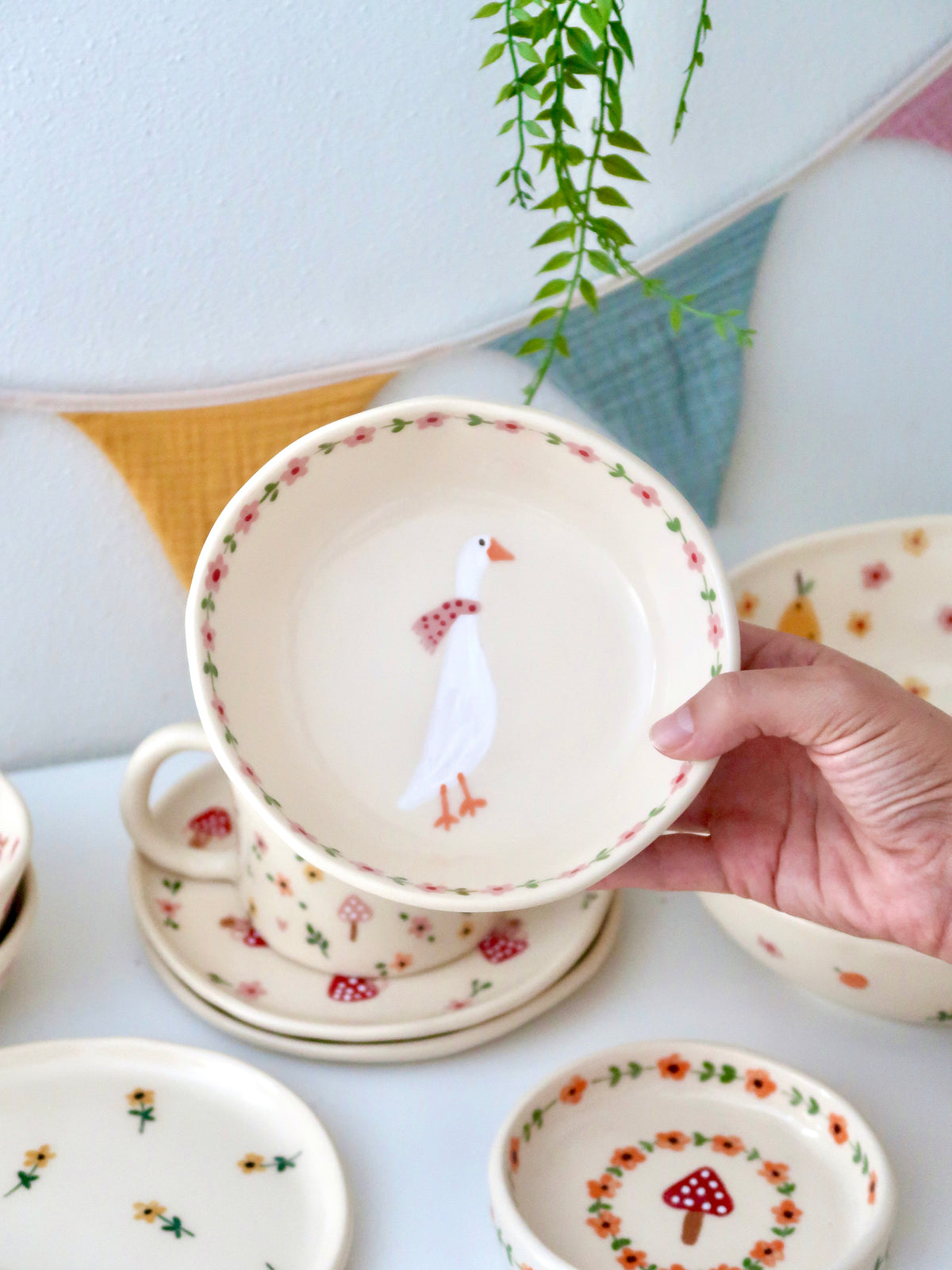 Bowl with a duck and pink flowers