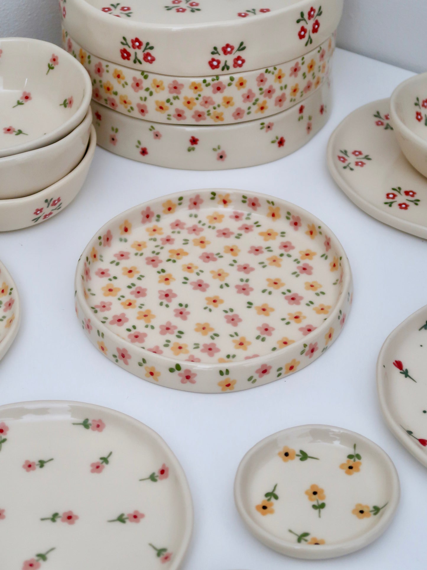 Small imperfection - High edge plate with yellow and pink flowers