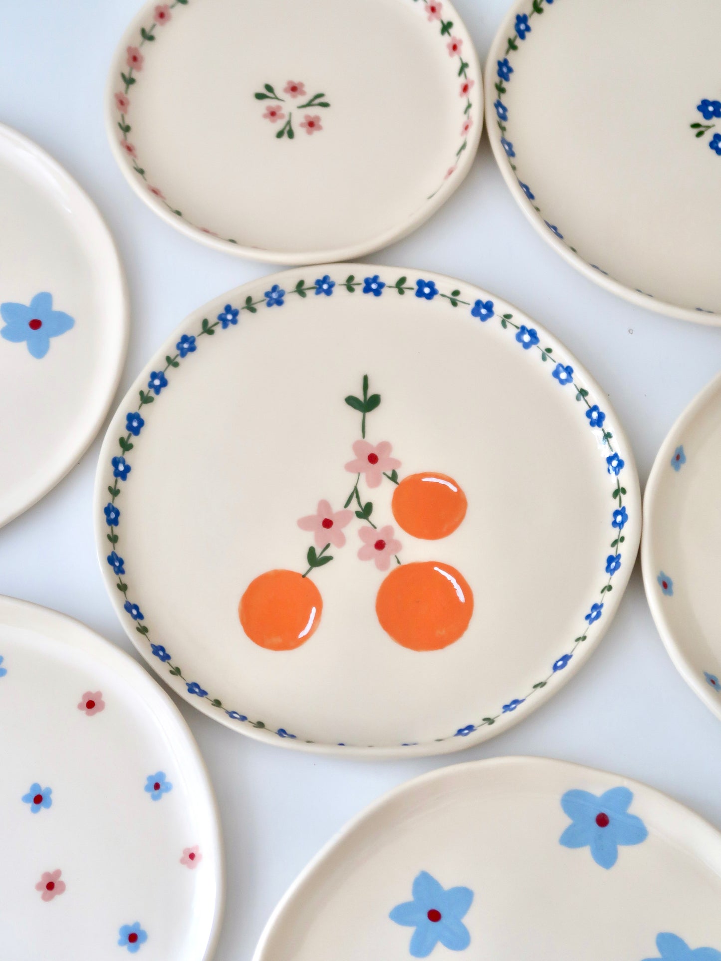 Plate with orange and blue flowers