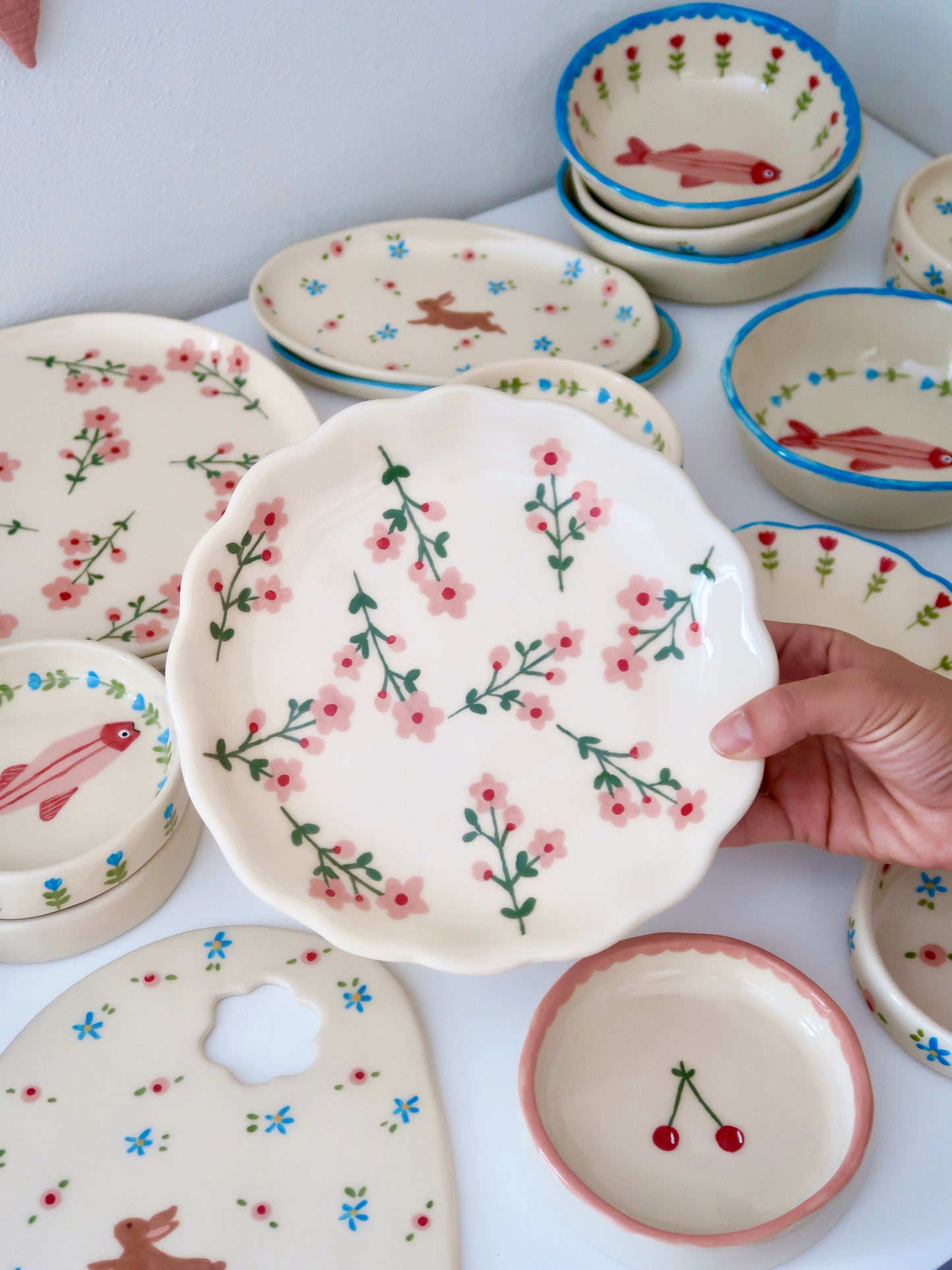 Scalloped plate with pink flowers