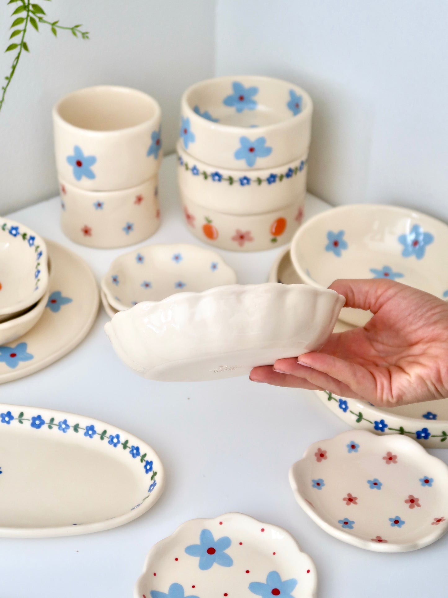 Scalloped bowl with blue flowers flowers